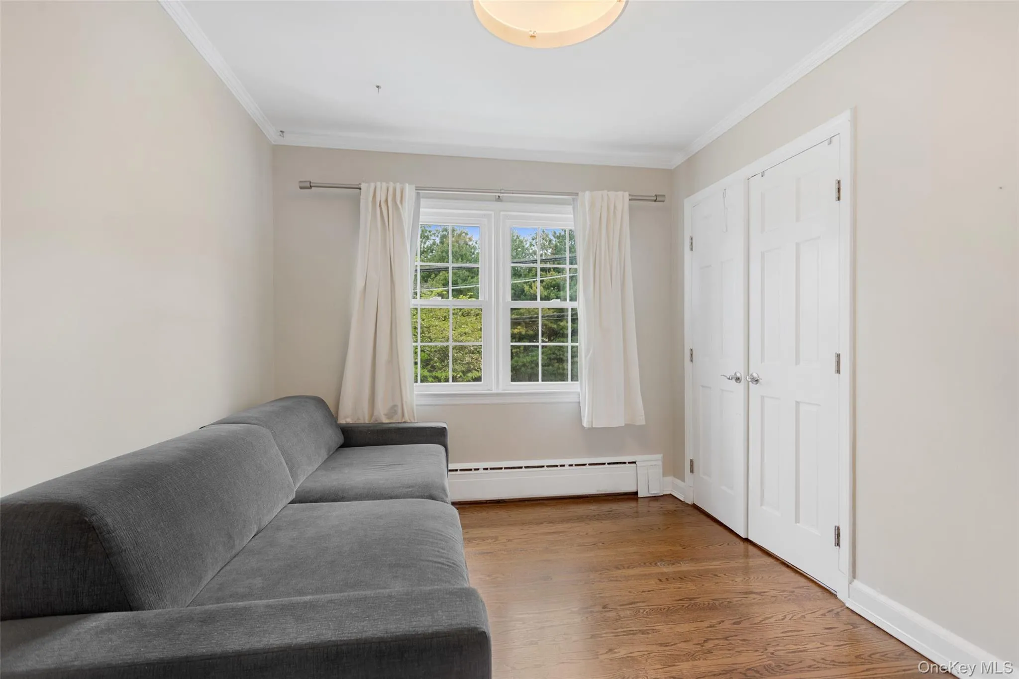 Third bedroom with double closet and window views. Third bedroom with double closet and window views.