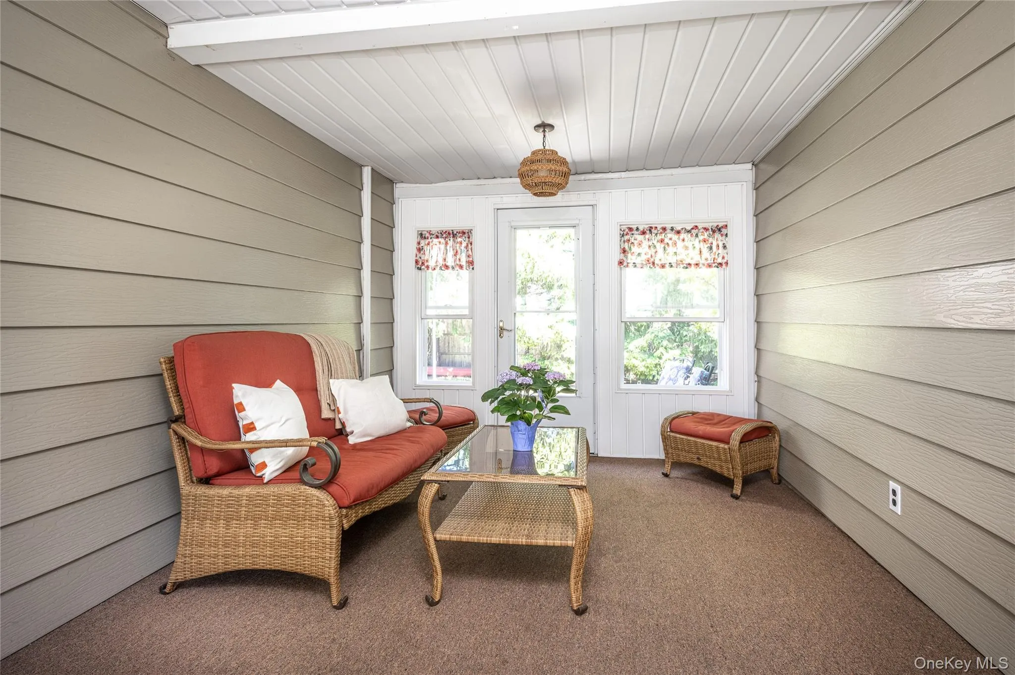Enclosed Breezeway with Door out to Yard and Patio Enclosed Breezeway with Door out to Yard and Patio