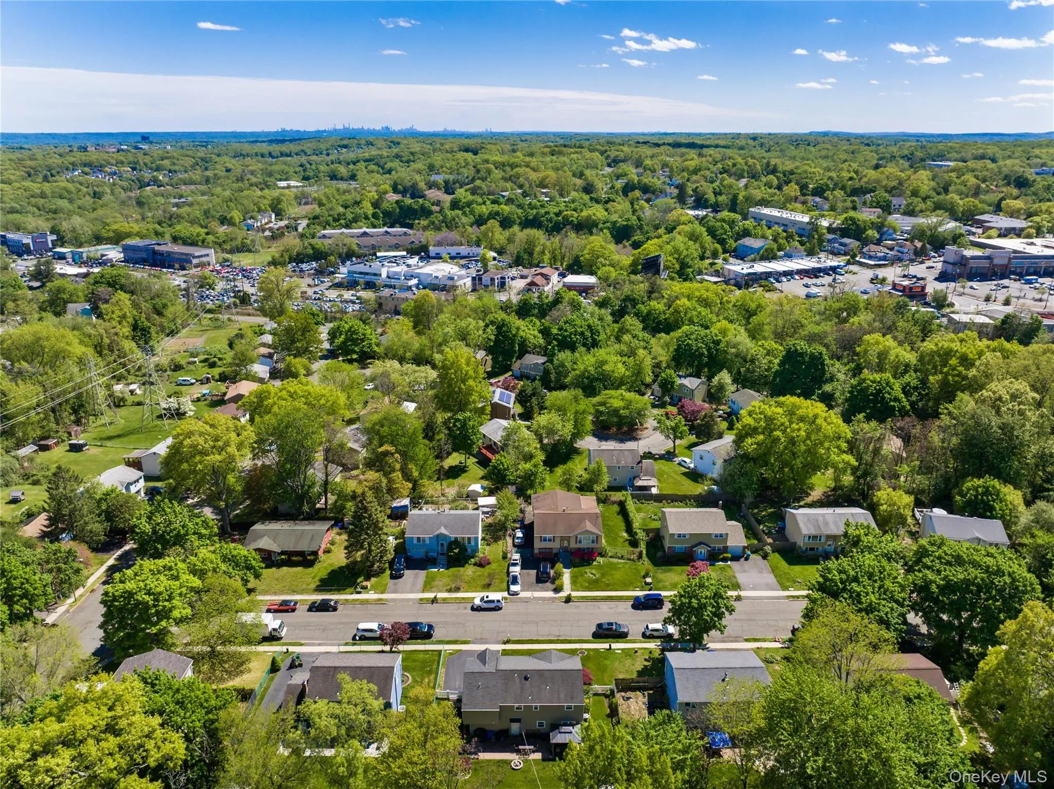 Residential neighborhood featuring mature trees and established homes Residential neighborhood featuring mature trees and established homes