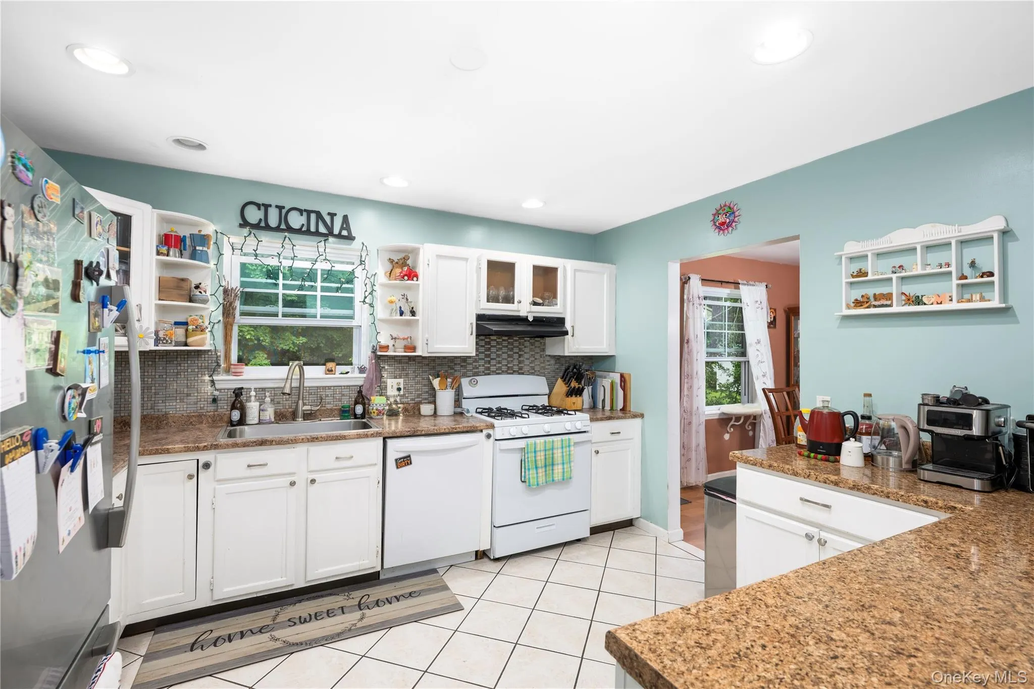 Updated kitchen, tile backsplash newer appliances Updated kitchen, tile backsplash newer appliances