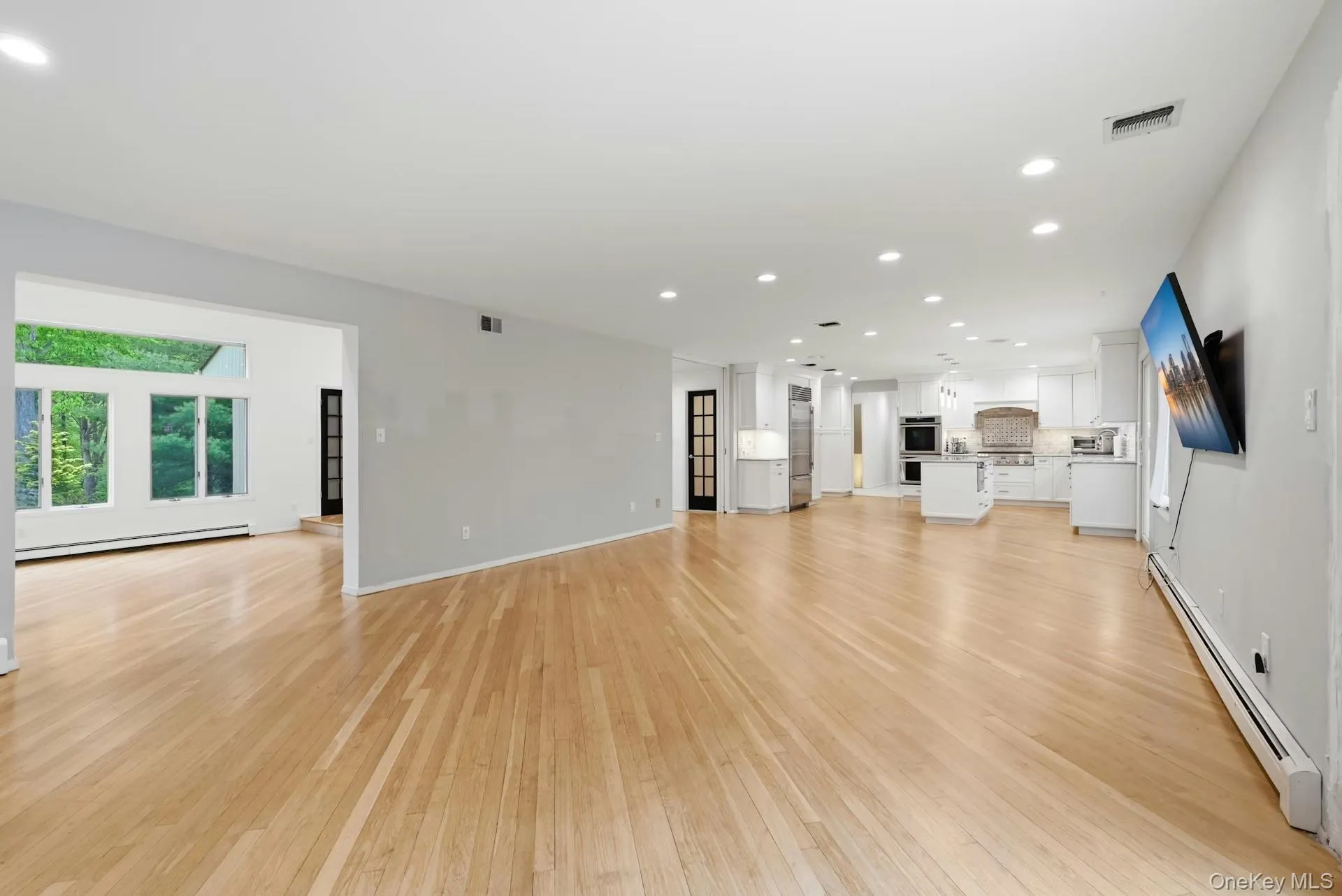Den and kitchen with formal living room Den and kitchen with formal living room