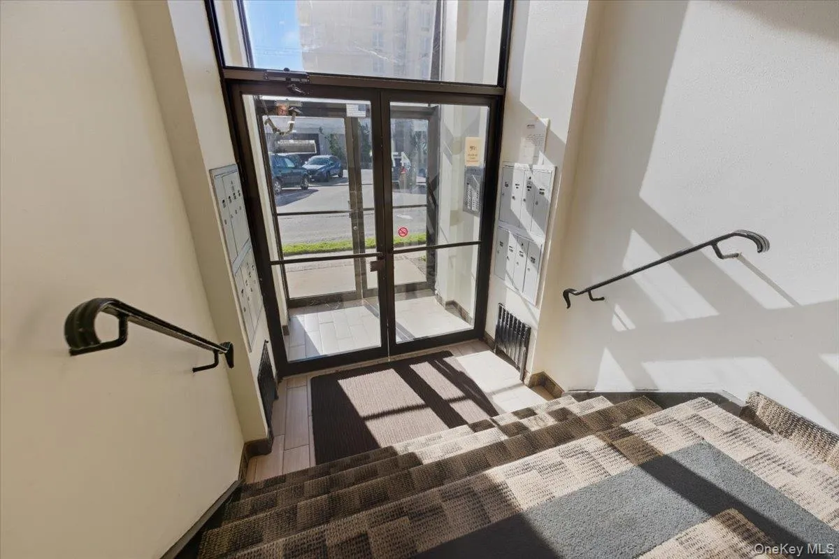Main entry foyer, security coded entry door, mailboxes. Main entry foyer, security coded entry door, mailboxes.