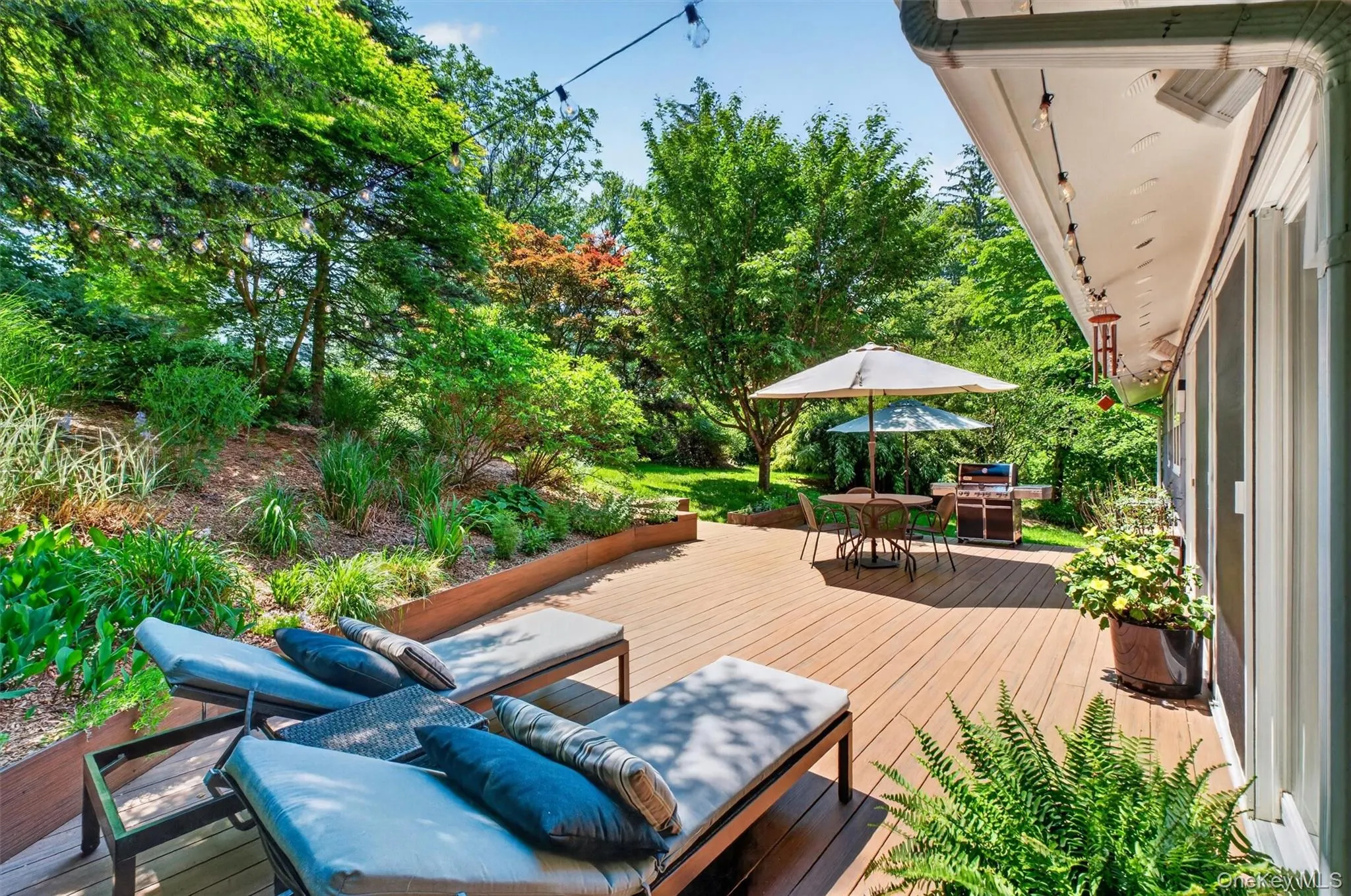 Bask on the oversized private deck surrounded by greener Bask on the oversized private deck surrounded by greener