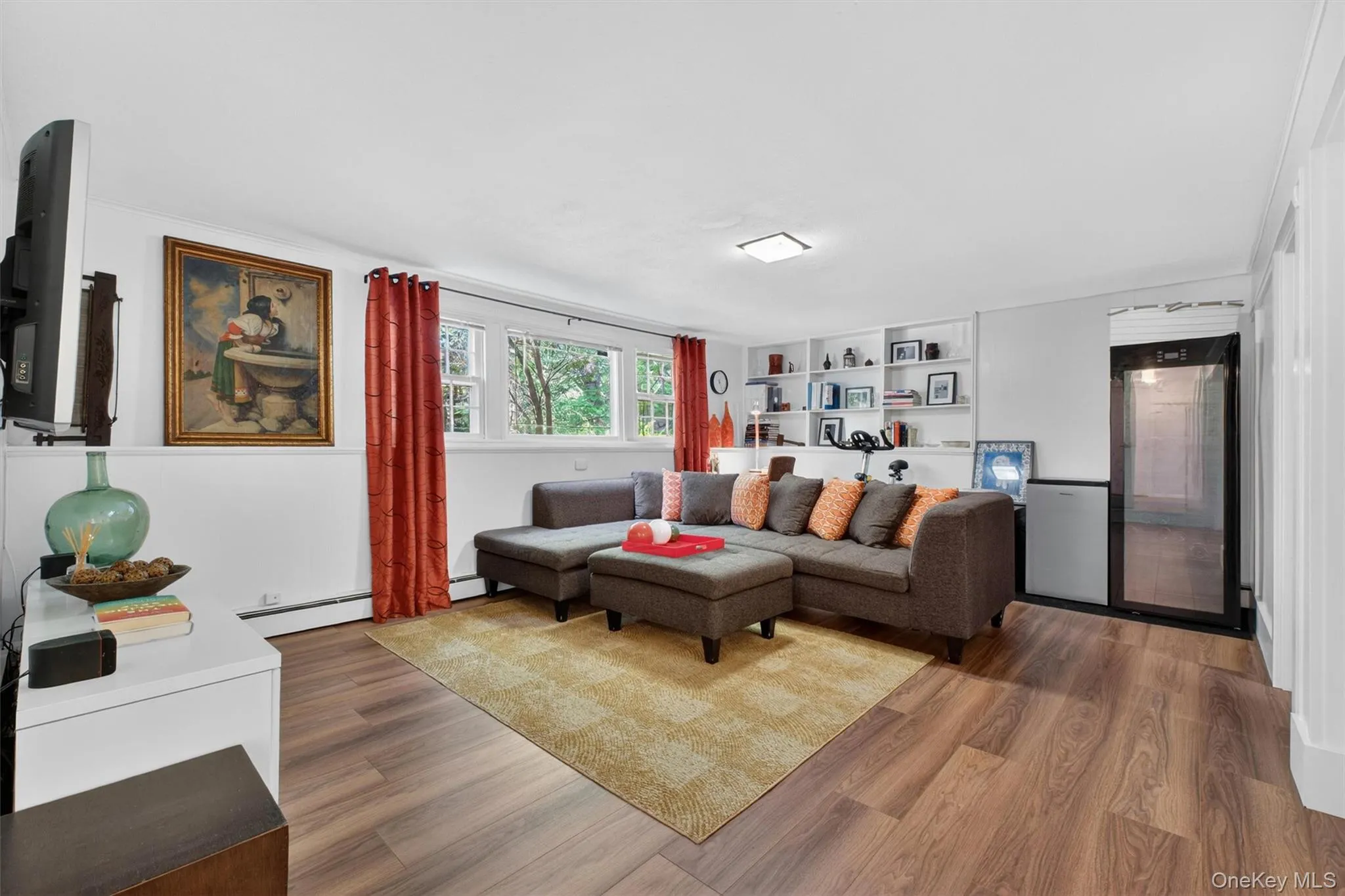 Treasure time in the oversized family room with a half bathroom and large spaces for gym, office and storage Treasure time in the oversized family room with a half bathroom and large spaces for gym, office and storage