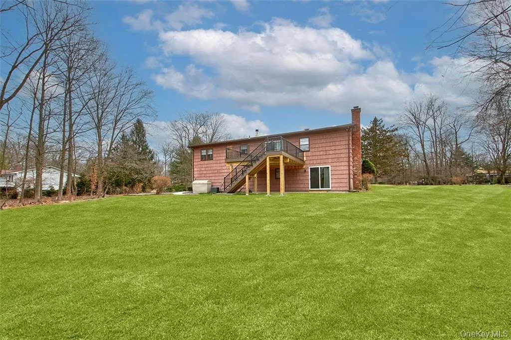 Expansive flat rear lawn Expansive flat rear lawn