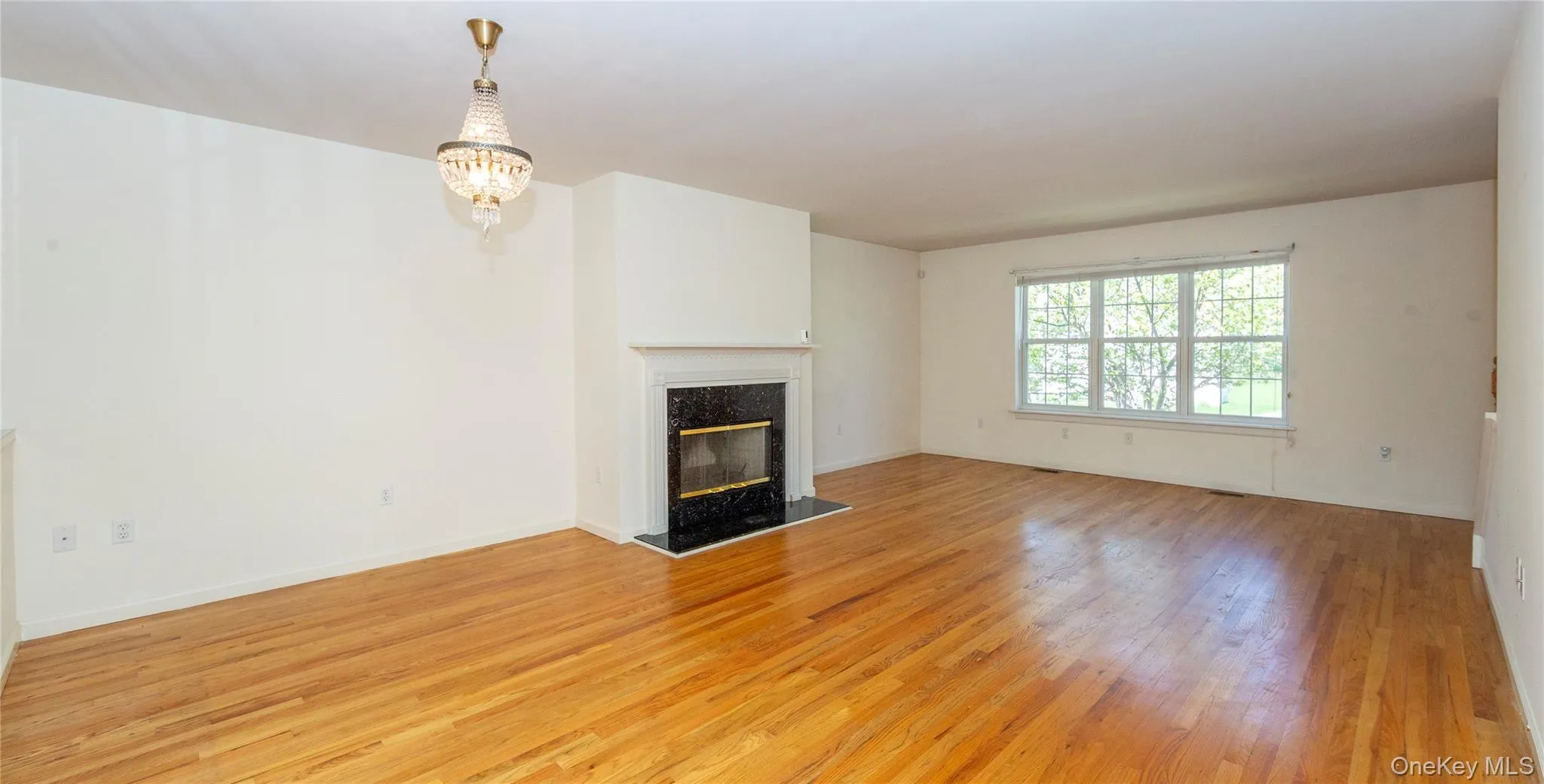 Where the living and dining room is anchored by a cozy wood-burning fireplace. Where the living and dining room is anchored by a cozy wood-burning fireplace.