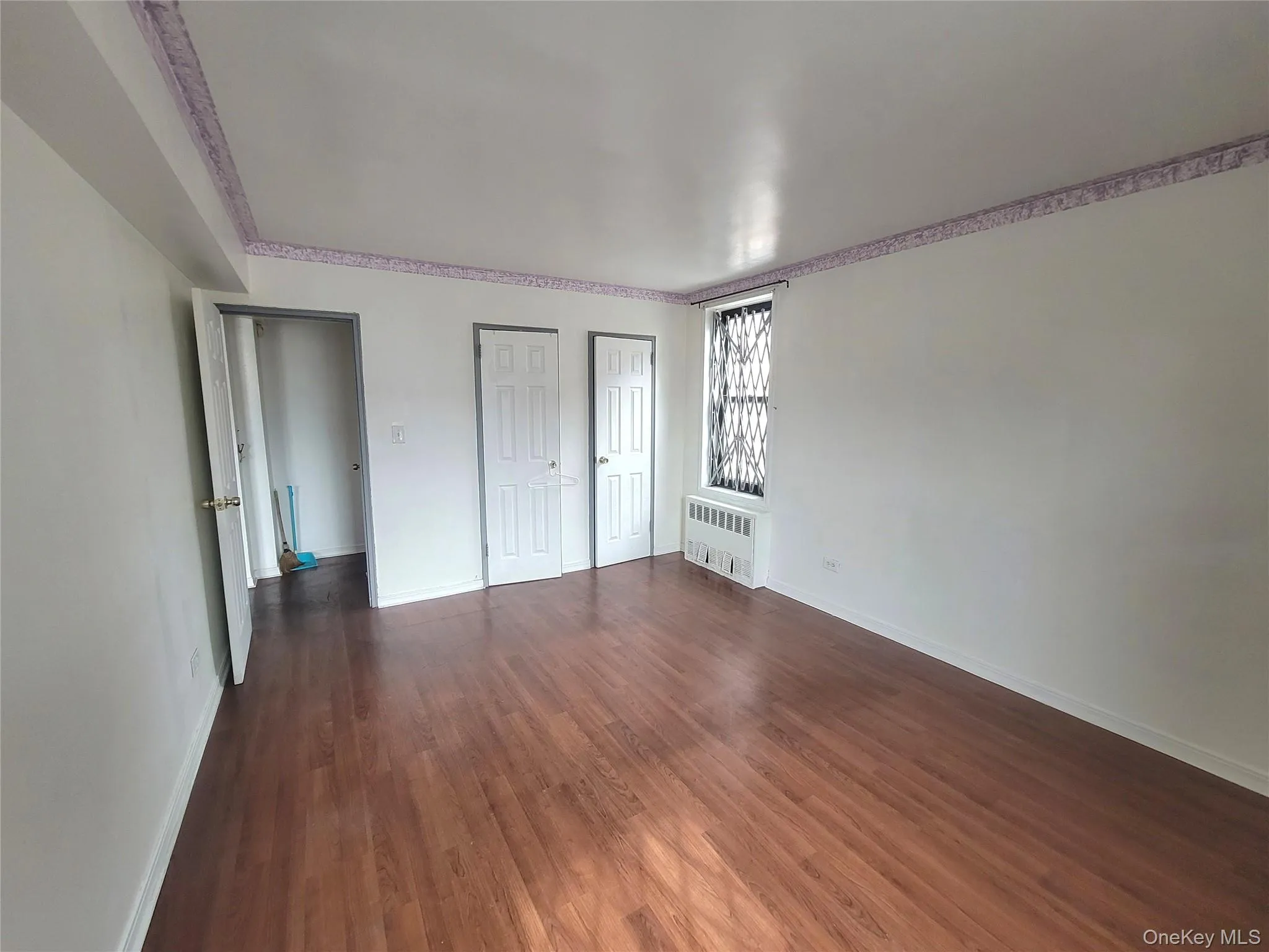 Bedroom with 2 windows and 2 closets Bedroom with 2 windows and 2 closets
