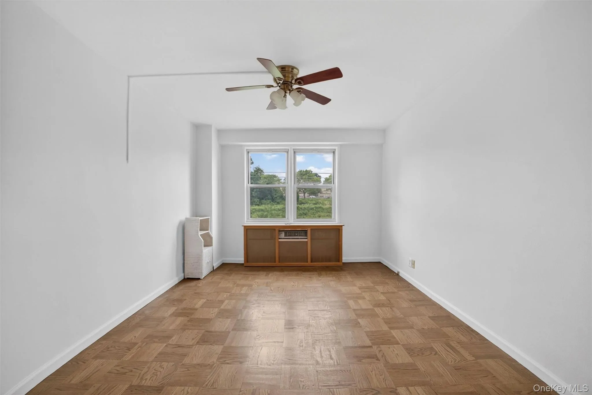 Bedroom#2, wood floor shown is the same in throughout the entire unit Bedroom#2, wood floor shown is the same in throughout the entire unit