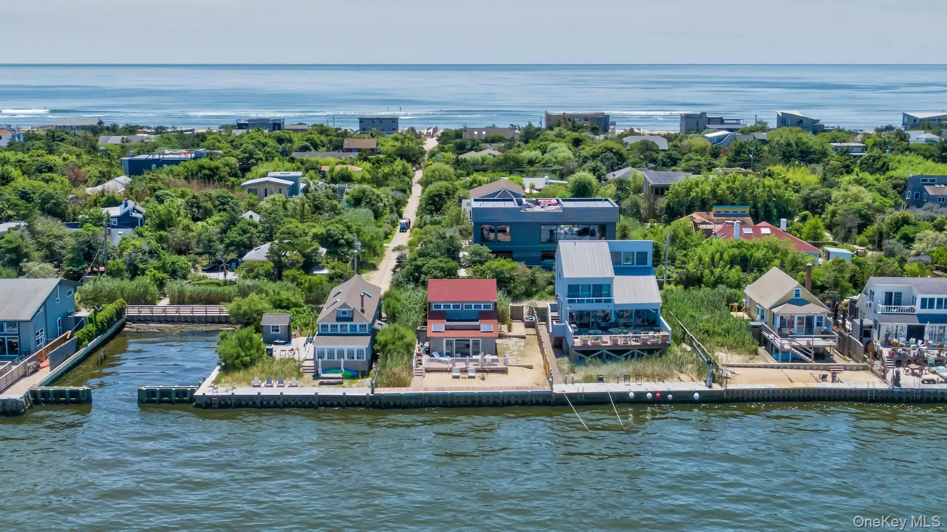 Waterfront property featuring a private boat slip, dock, and direct water access Waterfront property featuring a private boat slip, dock, and direct water access
