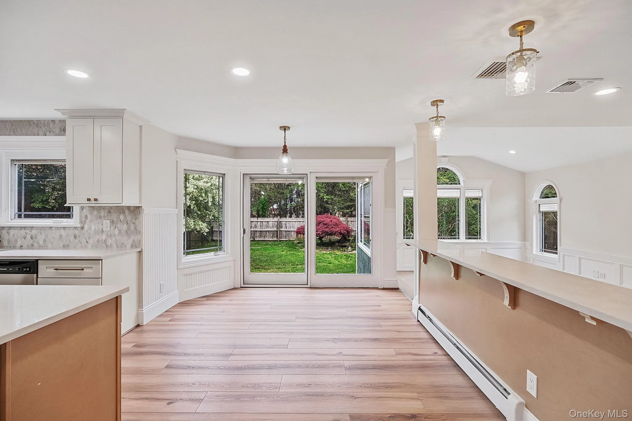 kitchen with breakfast bar open to living room kitchen with breakfast bar open to living room
