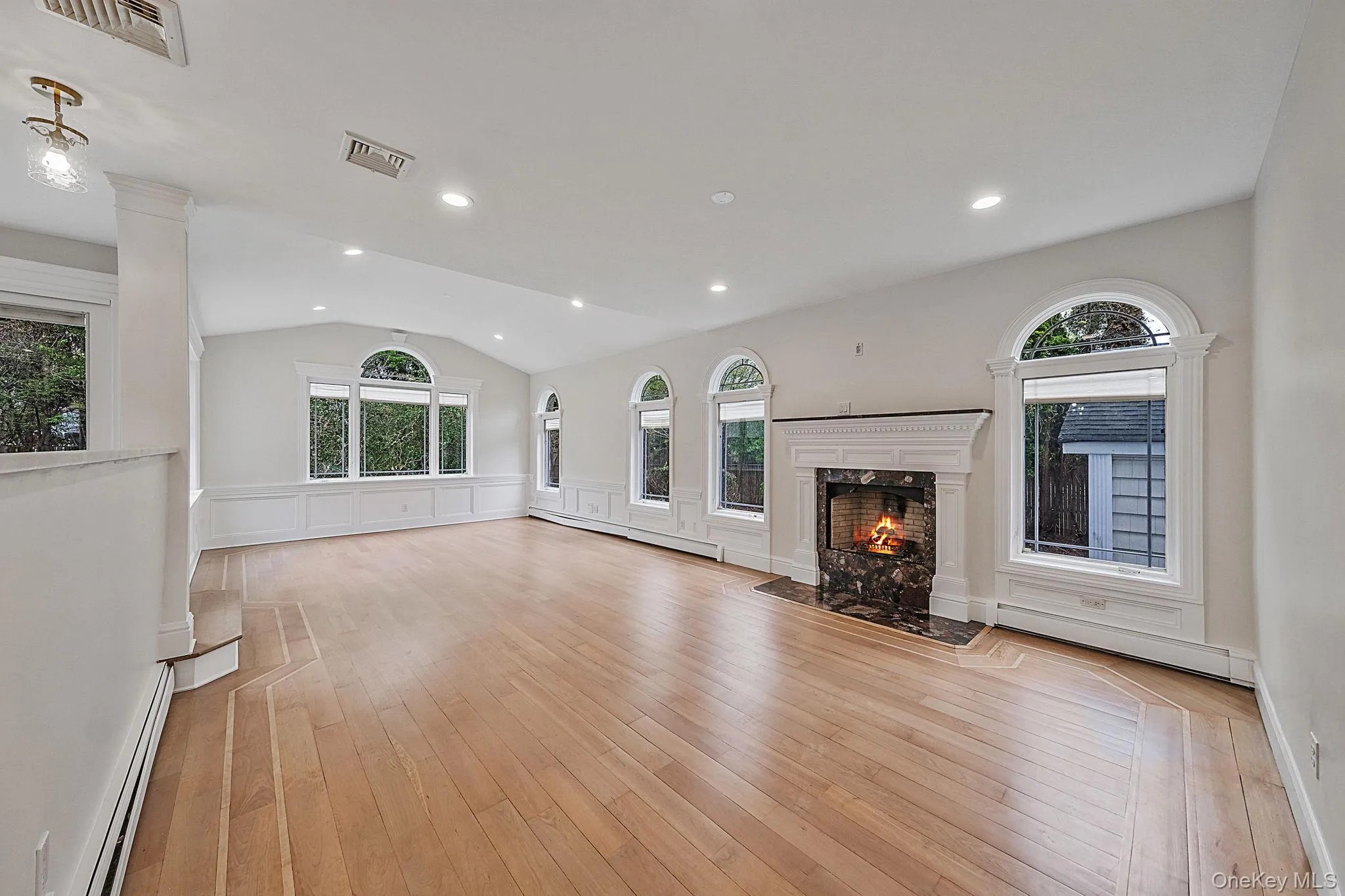 L.R. with fireplace, open to kitchen L.R. with fireplace, open to kitchen