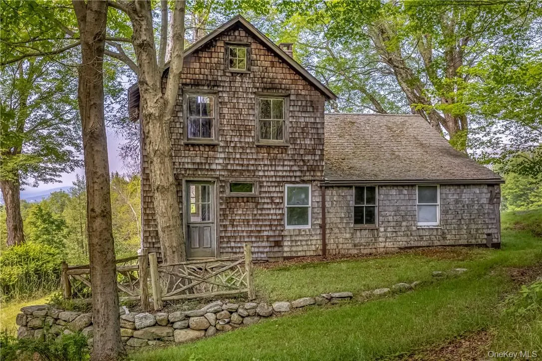 View of side of property with a lawn View of side of property with a lawn