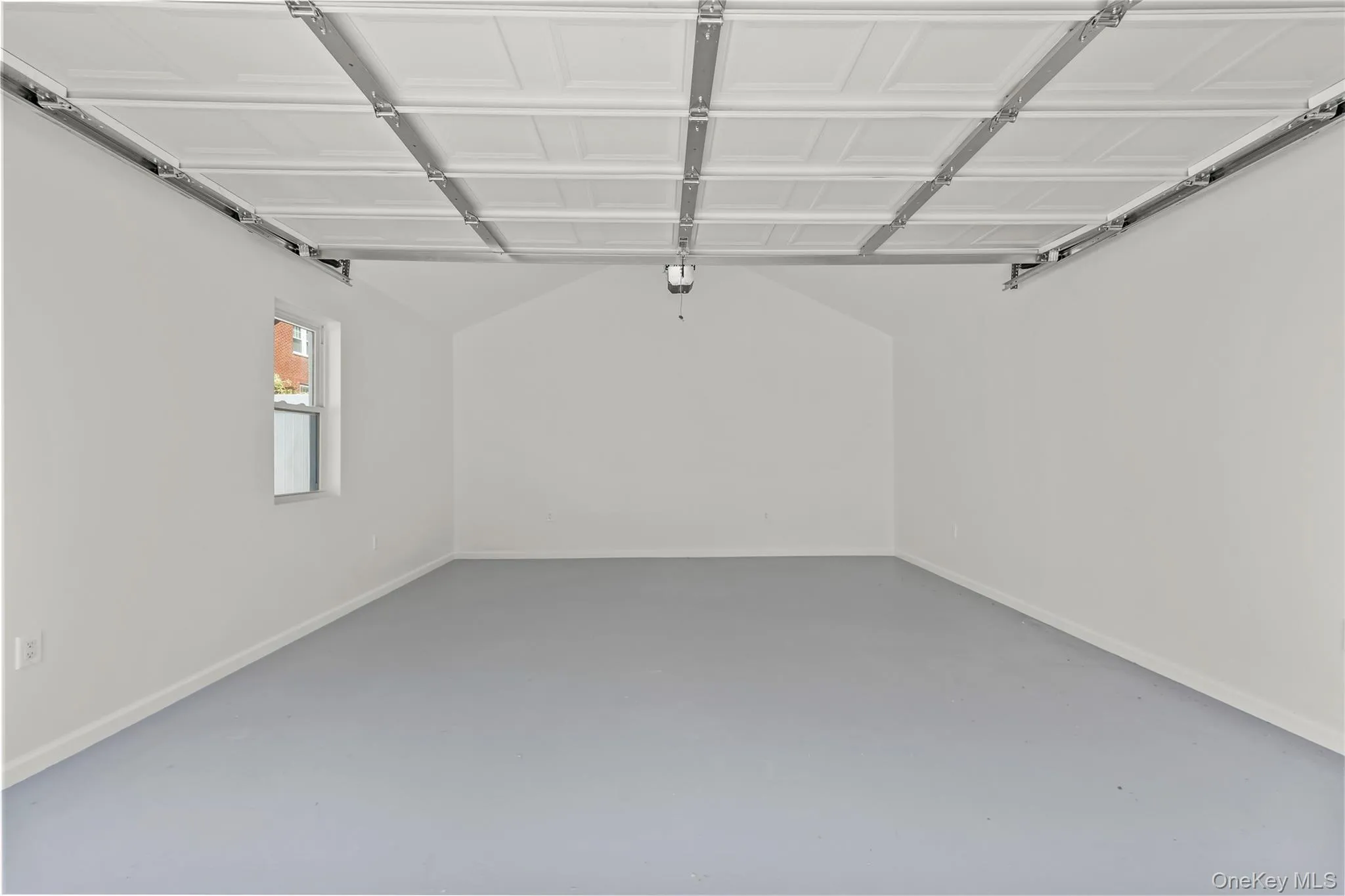 Professionally Finished 2-Car Garage with Auto Lift System Professionally Finished 2-Car Garage with Auto Lift System