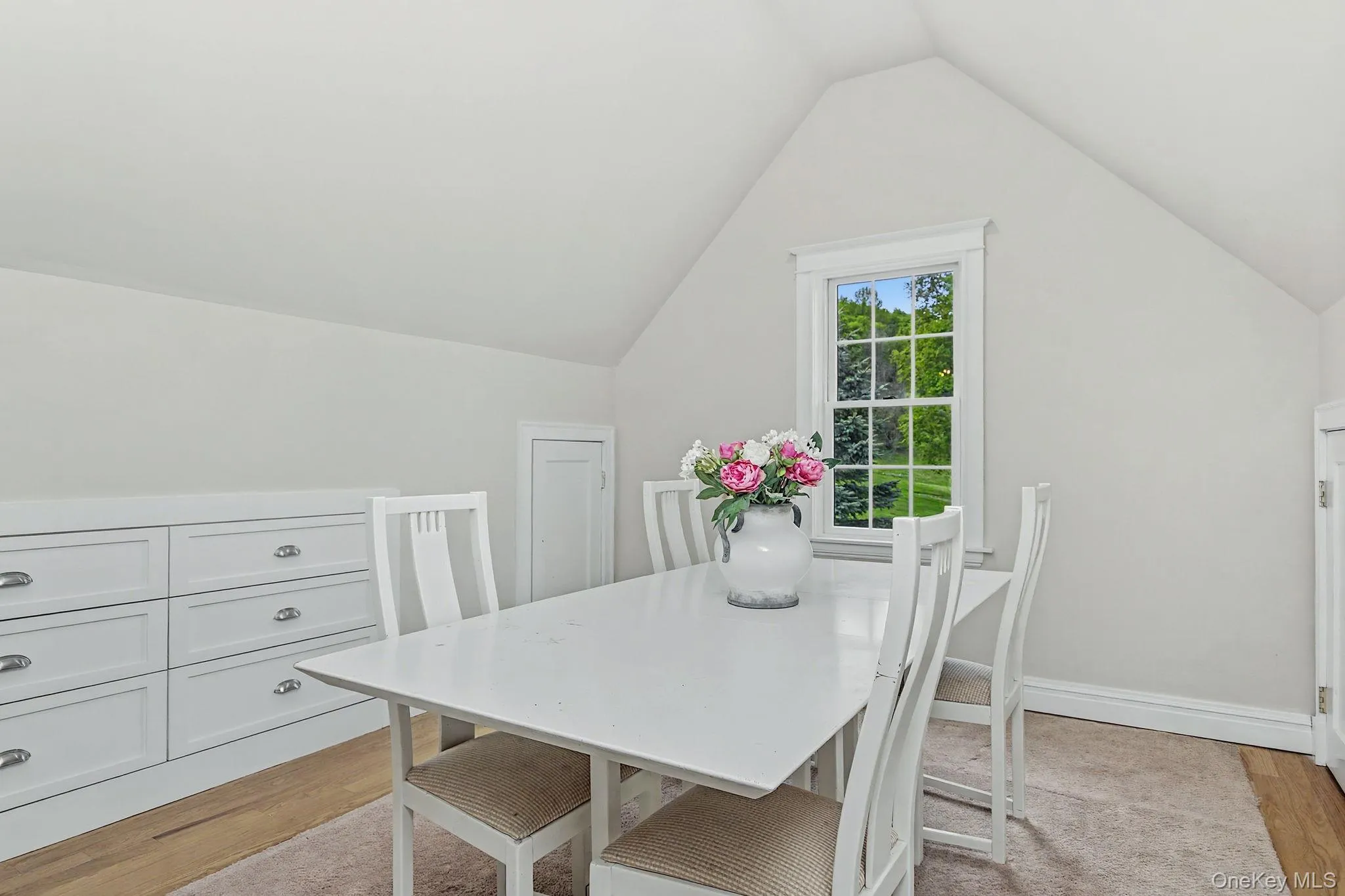 ...cathedral ceiling, built-in storage cabinetry with drawers, HWF, and crisp white trim... ...cathedral ceiling, built-in storage cabinetry with drawers, HWF, and crisp white trim...