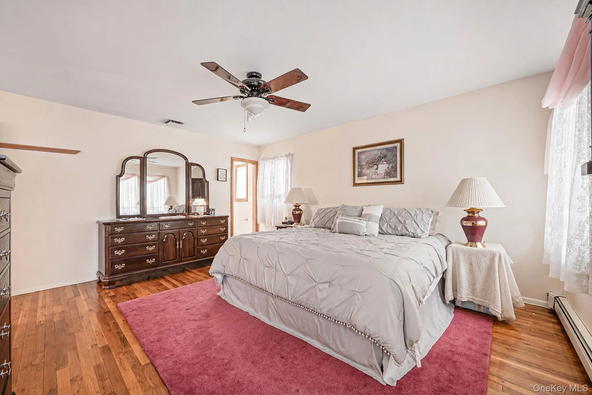 Primary En-Suite with HW Floors, Full Bathroom Primary En-Suite with HW Floors, Full Bathroom