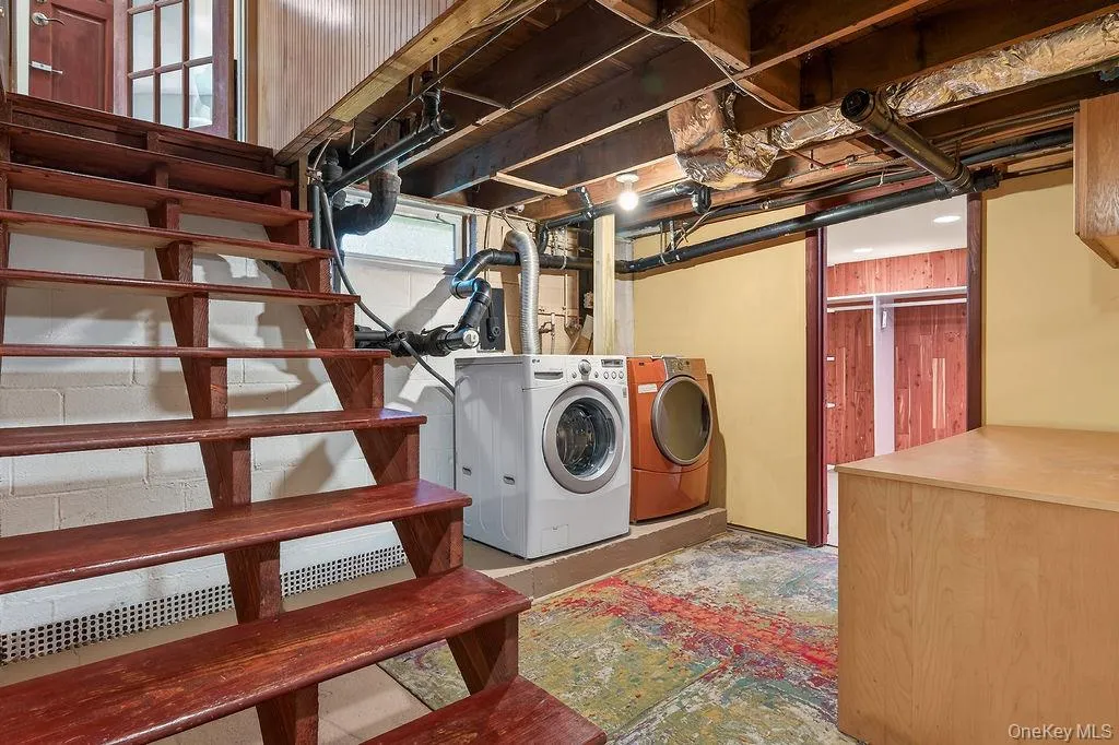 Full basement with a laundry area Full basement with a laundry area
