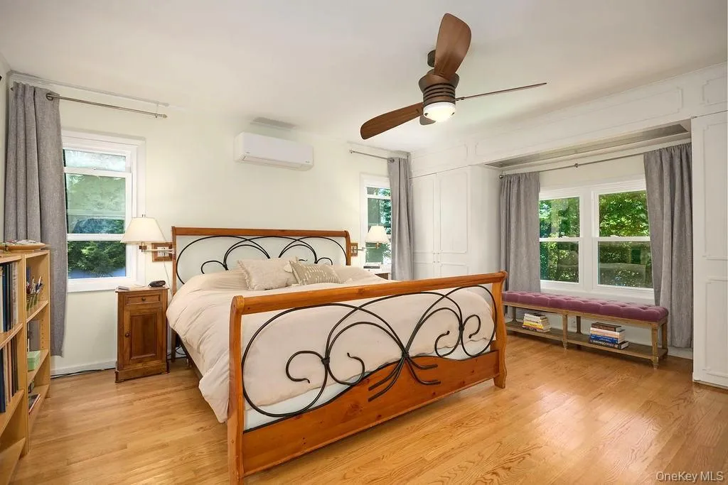 Spacious primary bedroom with A/C split unit for extra comfort Spacious primary bedroom with A/C split unit for extra comfort