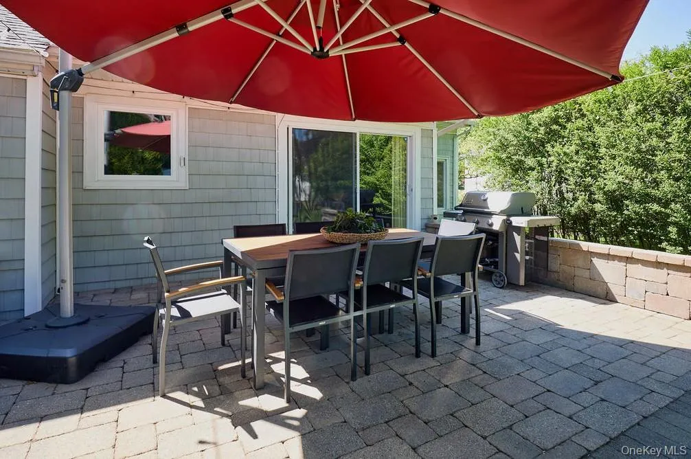 Private patio and sliding door providing access to the dining room Private patio and sliding door providing access to the dining room