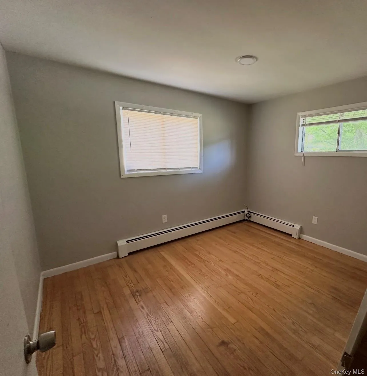 One of the bedrooms with wood floors One of the bedrooms with wood floors
