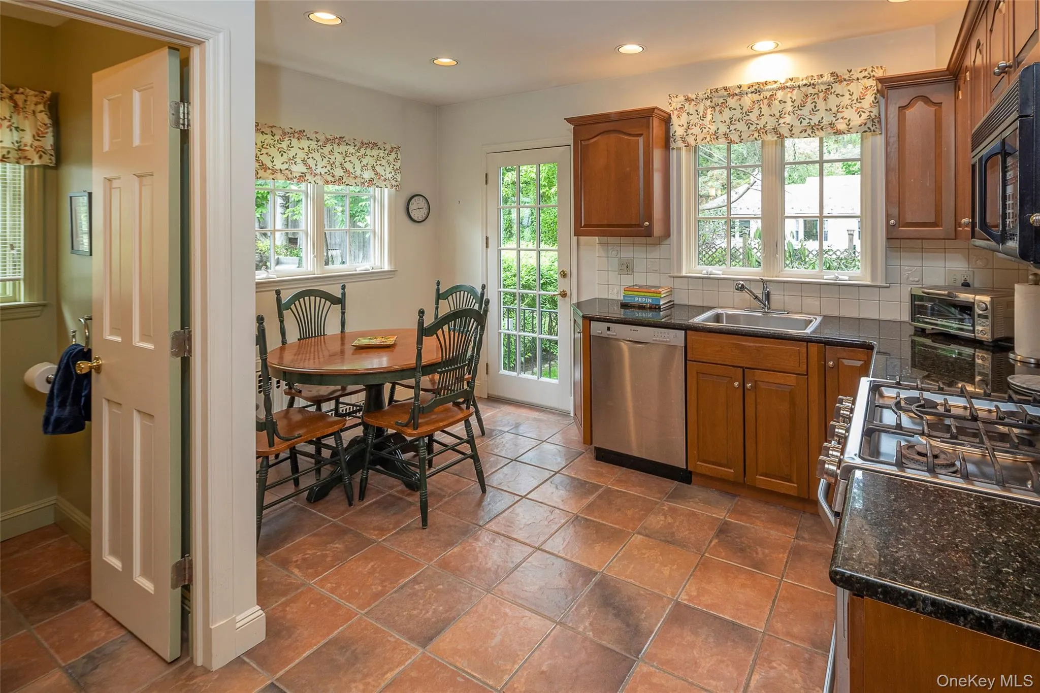 Eat in Kitchen with door to back yard Eat in Kitchen with door to back yard