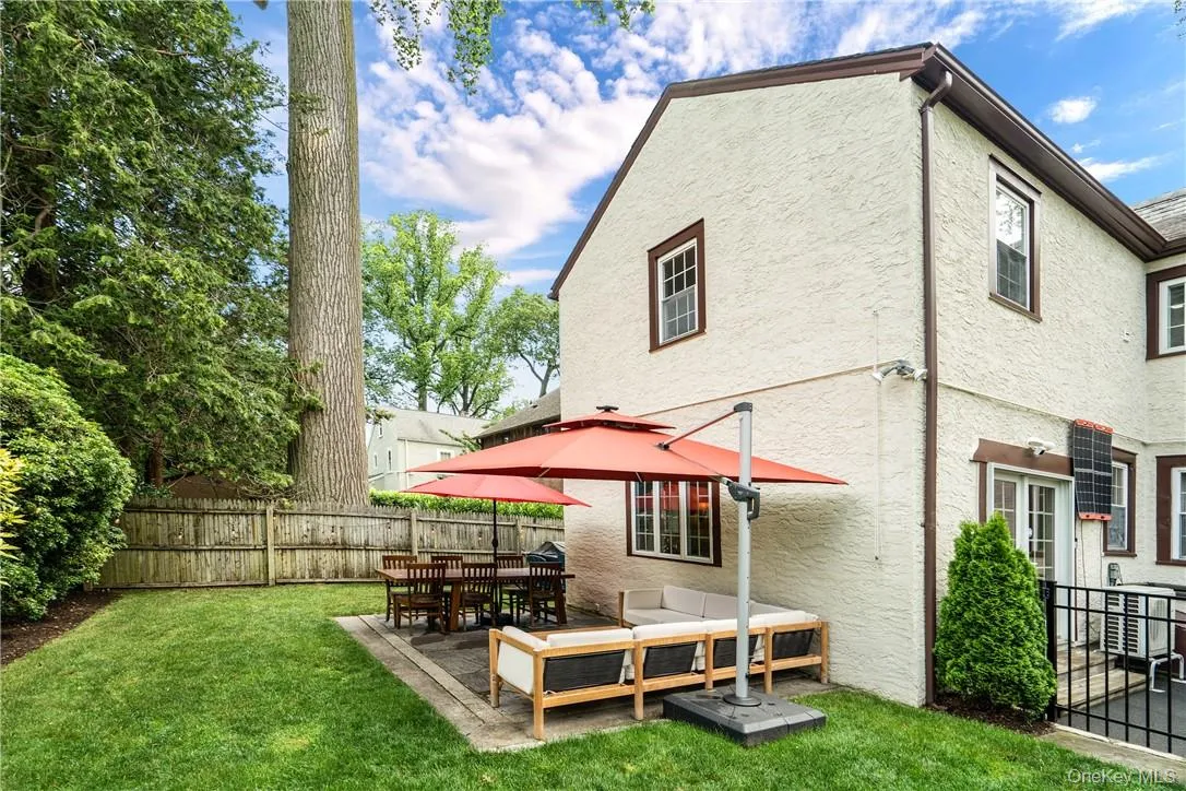 Large patio with room for a dining table and seating area Large patio with room for a dining table and seating area