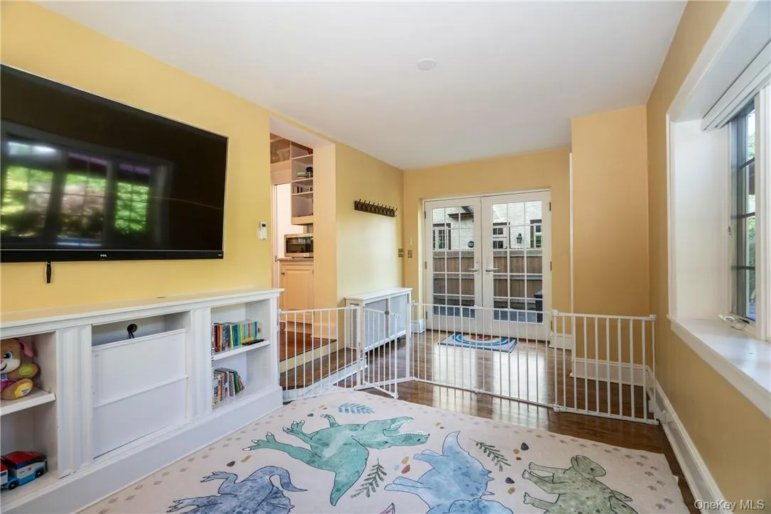 Family room off of the kitchen has built-ins and access to the backyard Family room off of the kitchen has built-ins and access to the backyard