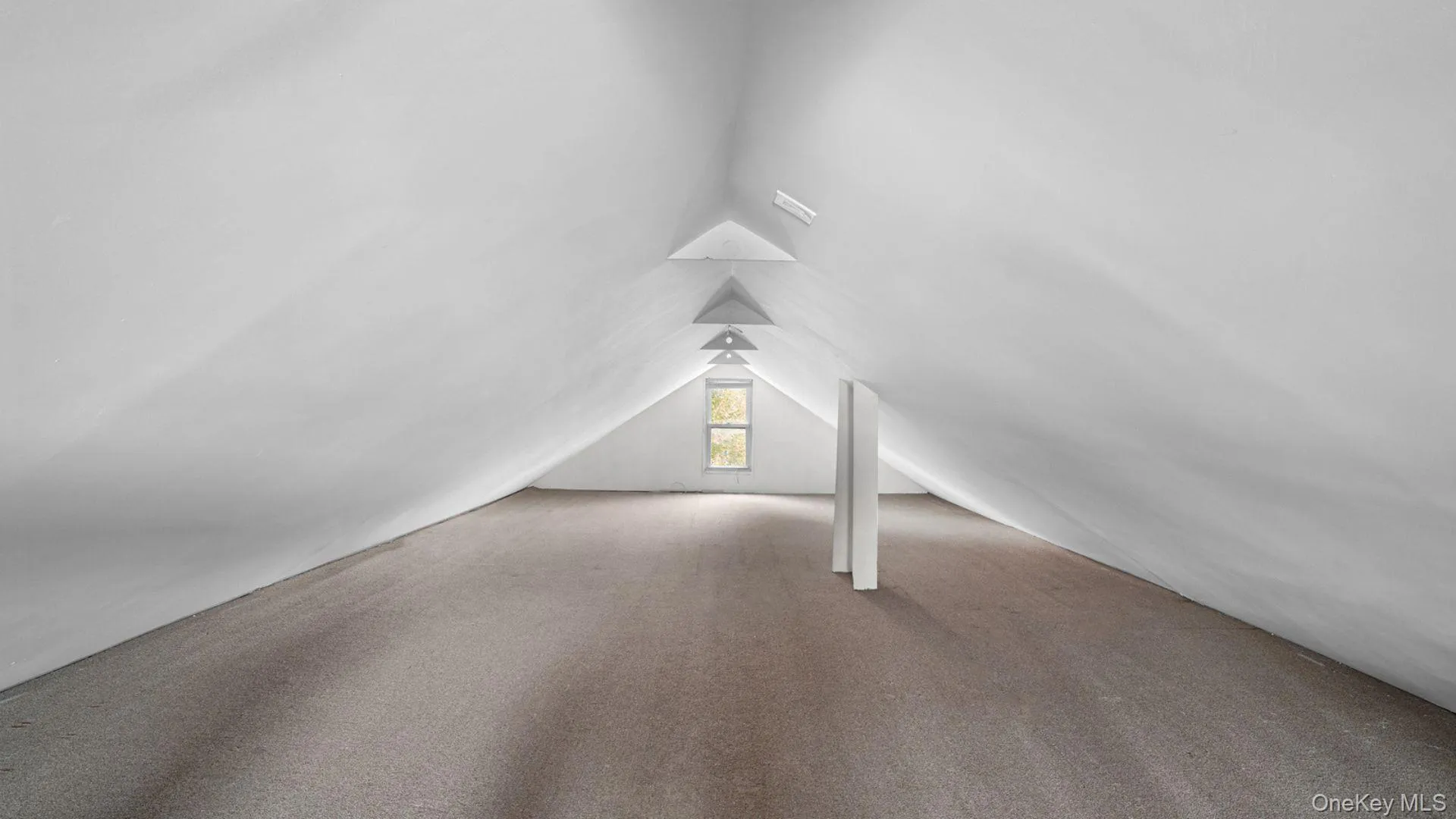 Additional living space featuring carpet floors and lofted ceiling Additional living space featuring carpet floors and lofted ceiling