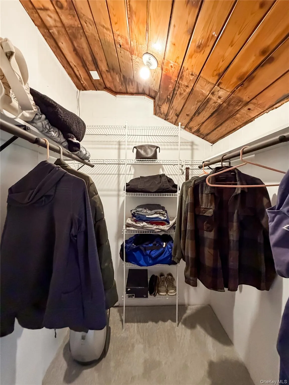 Walk-in closet in Primary BR Walk-in closet in Primary BR