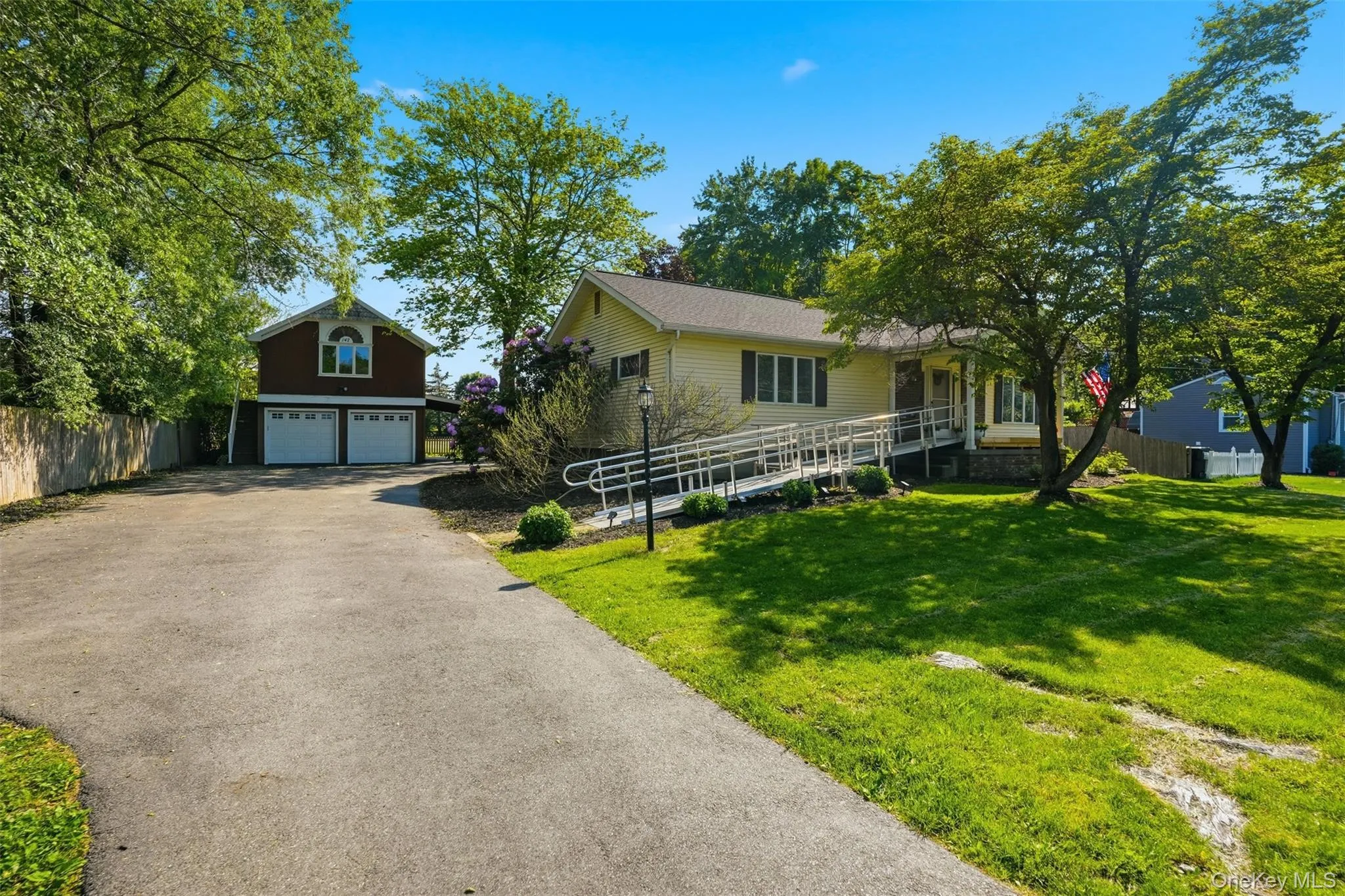 Paved driveway leads to 2 car garage. Paved driveway leads to 2 car garage.