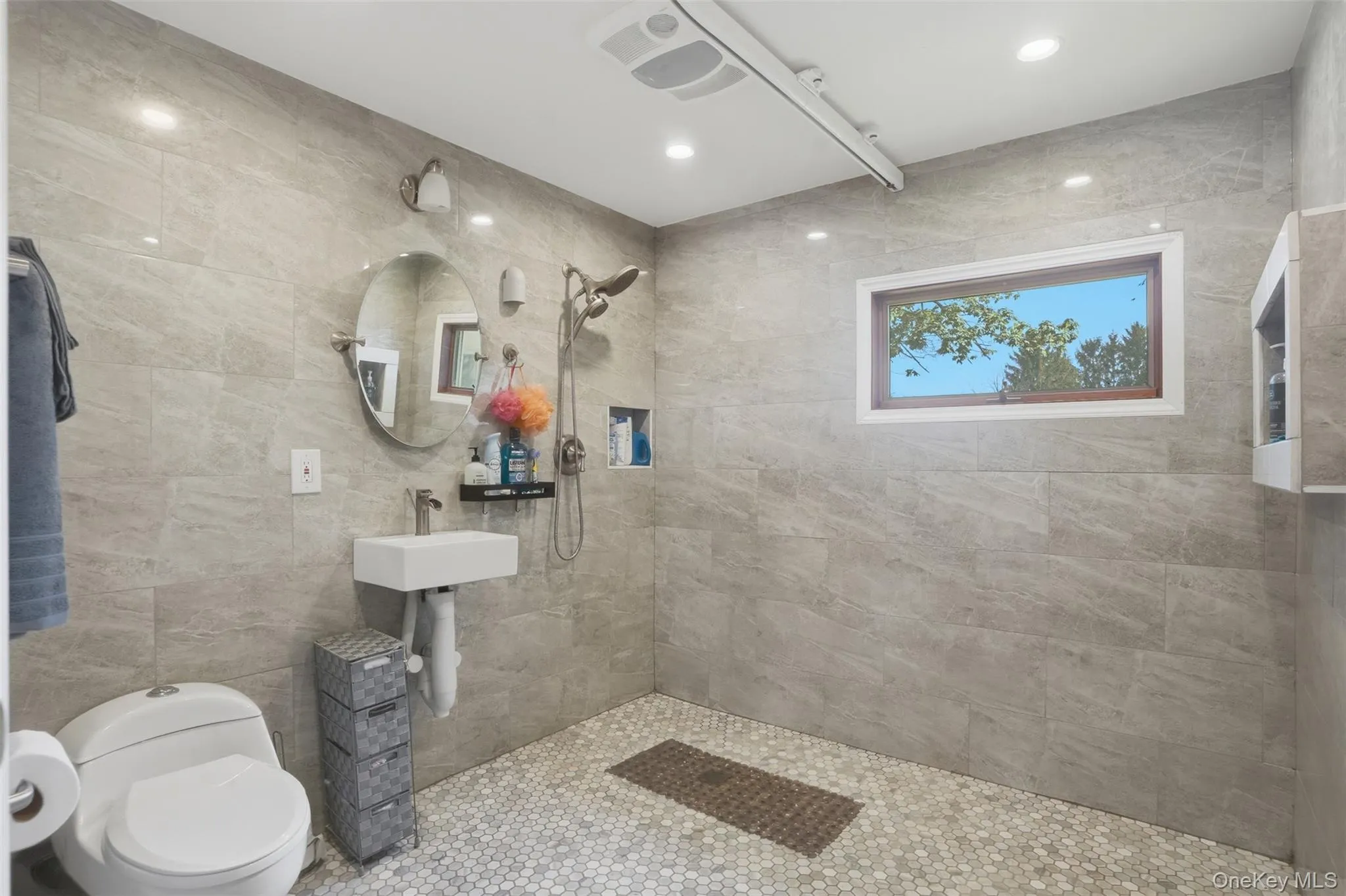 This large, open bathroom meets ADA standards. This large, open bathroom meets ADA standards.
