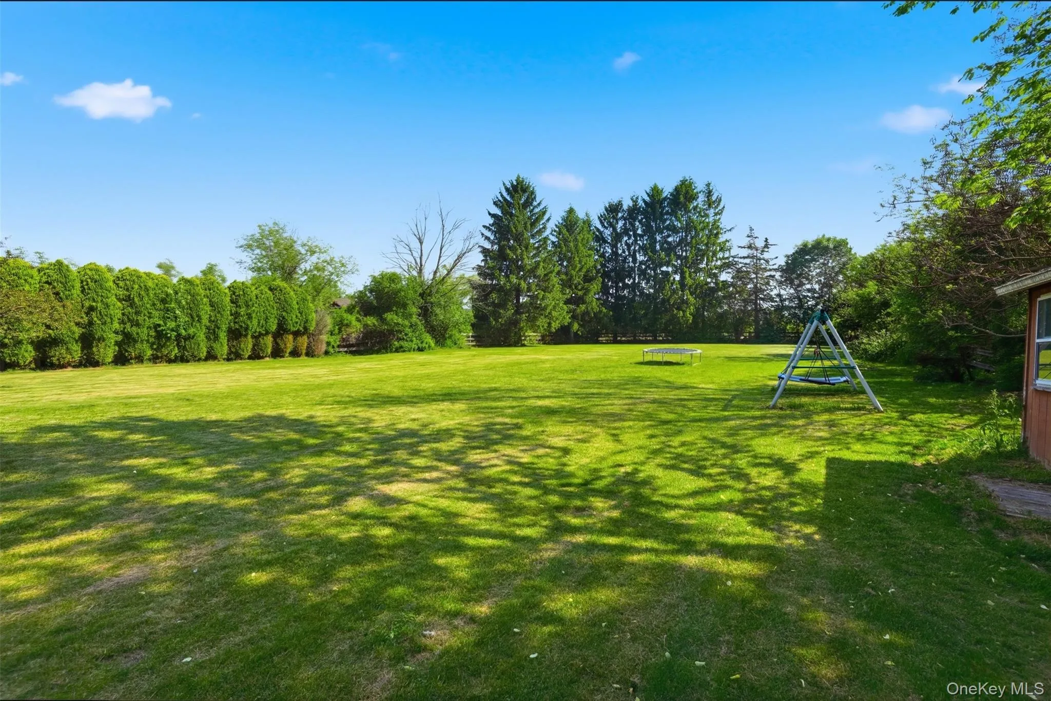 Private tree-lined yard with so many possibilities. Private tree-lined yard with so many possibilities.
