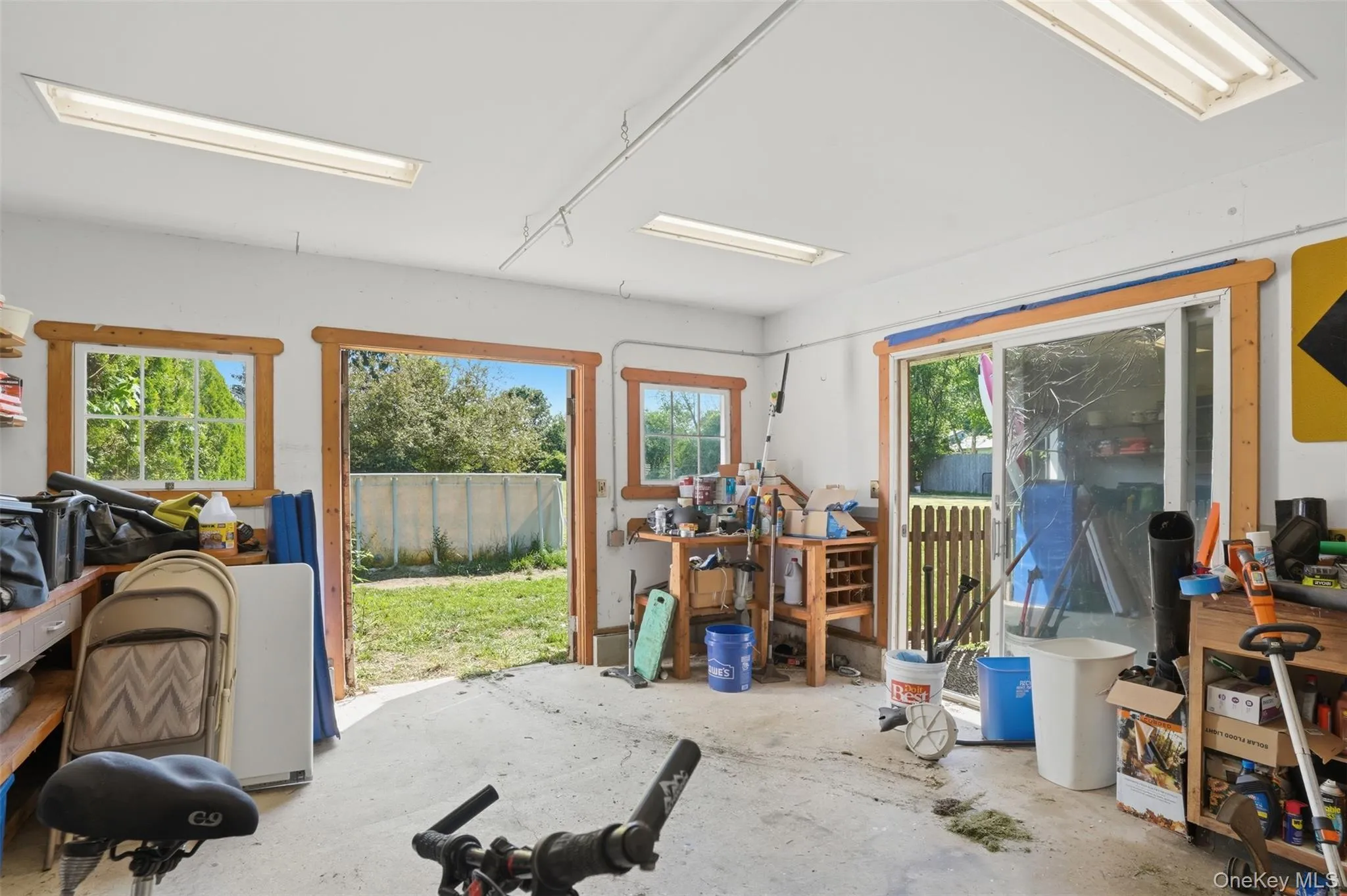 Easy access through garage or yard to this large space for storage or work area. Easy access through garage or yard to this large space for storage or work area.