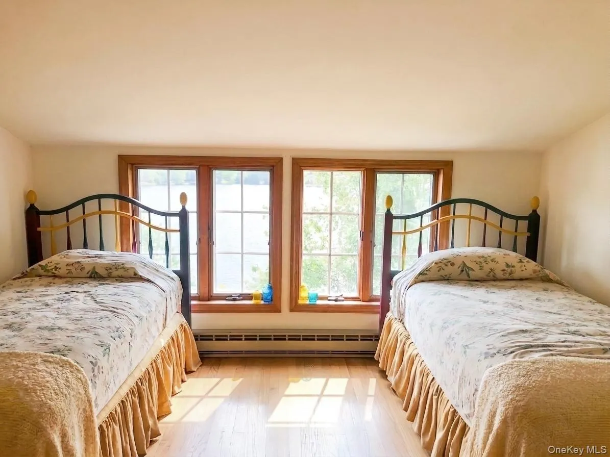 The second bedroom looks over the lake enjoying year round views The second bedroom looks over the lake enjoying year round views