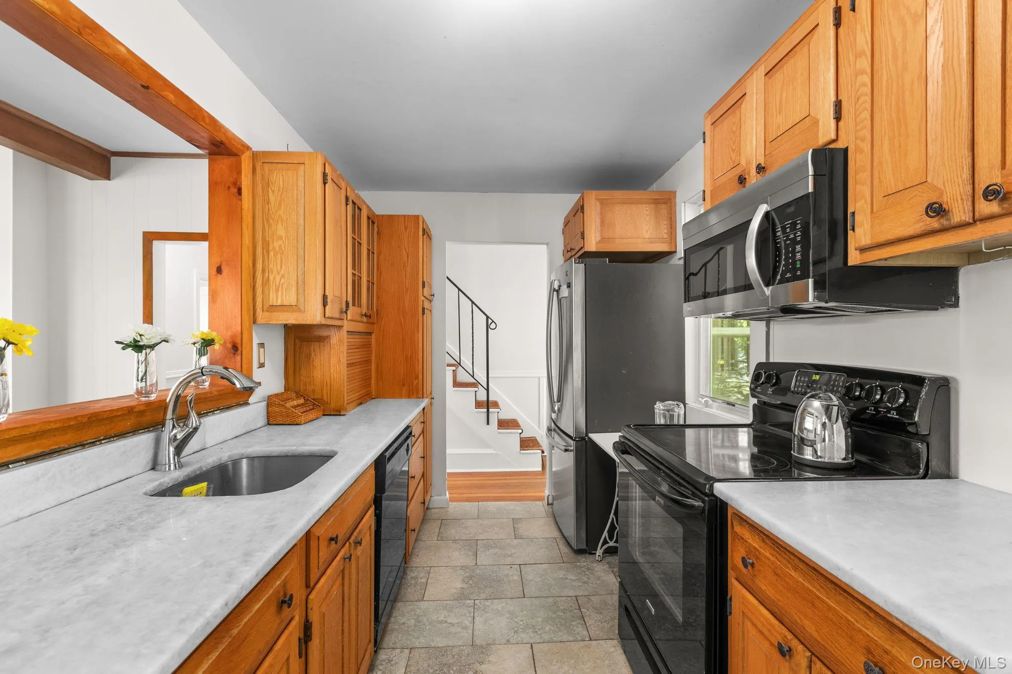 The location is steps away from both the living room and dining room making entertaining a breeze The location is steps away from both the living room and dining room making entertaining a breeze