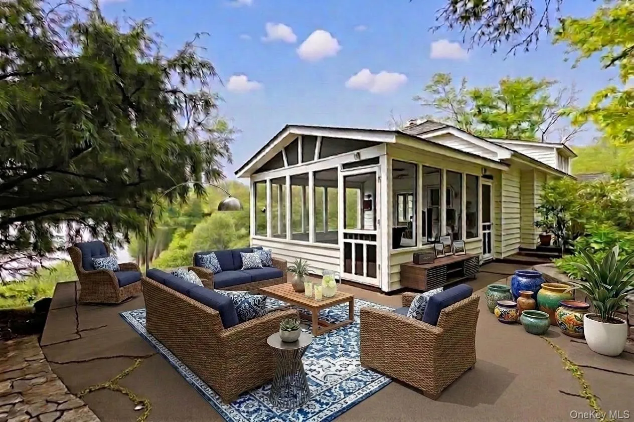 Virtually staged as an outdoor dining and conversational area Virtually staged as an outdoor dining and conversational area