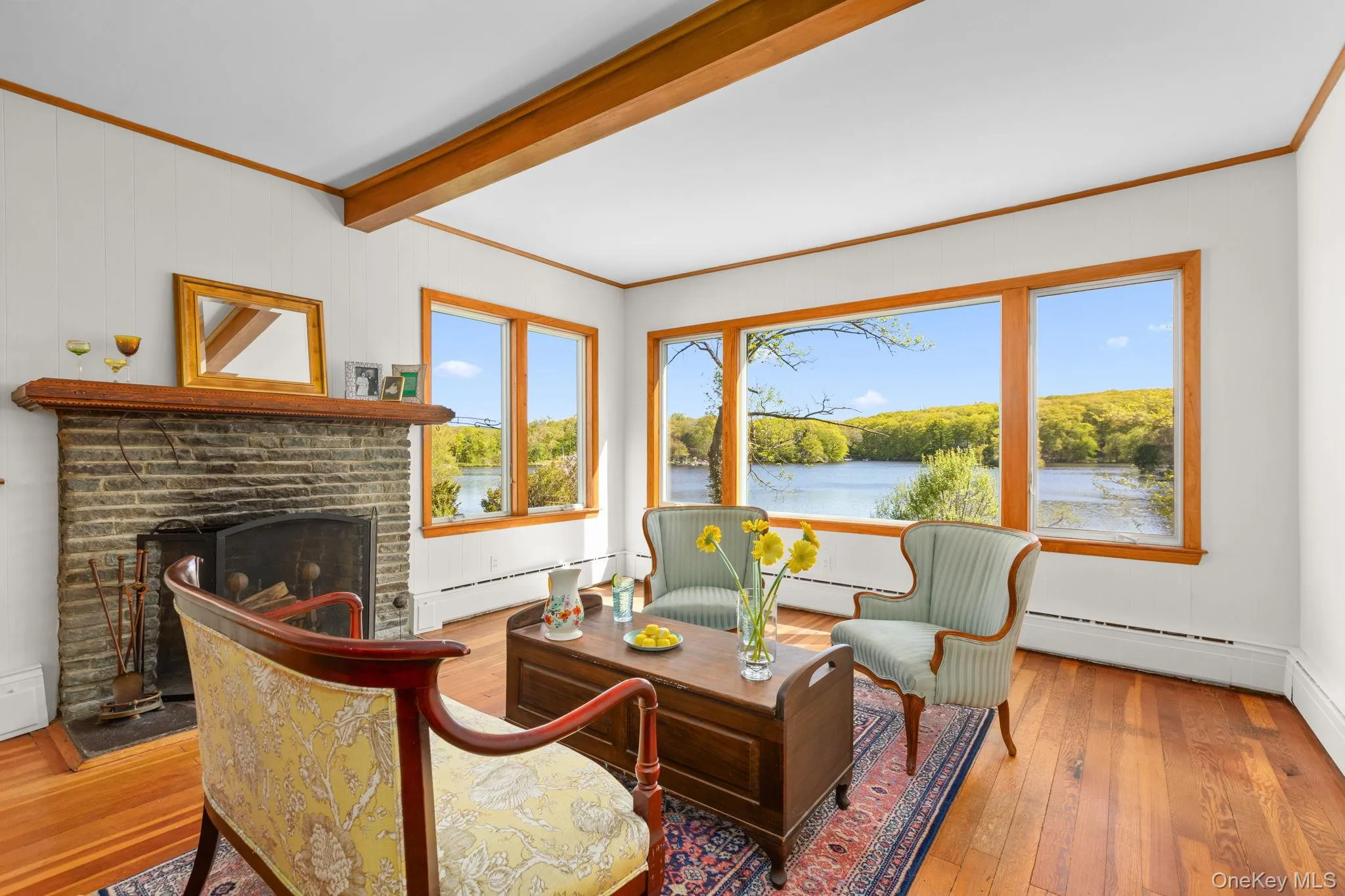 This lovely space invites year long views of the lake This lovely space invites year long views of the lake