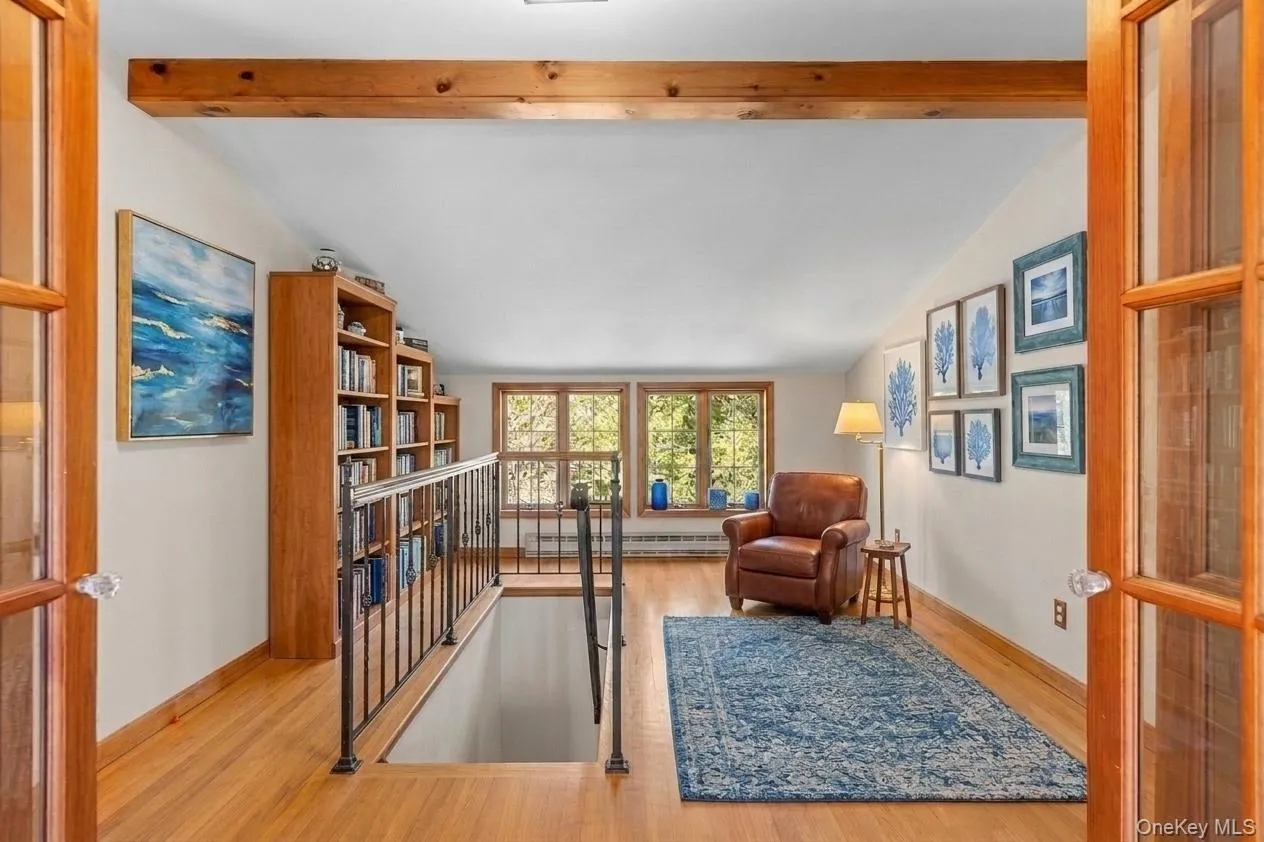 The upstairs open area virtually staged as a cozy reading nook but the choice is yours The upstairs open area virtually staged as a cozy reading nook but the choice is yours