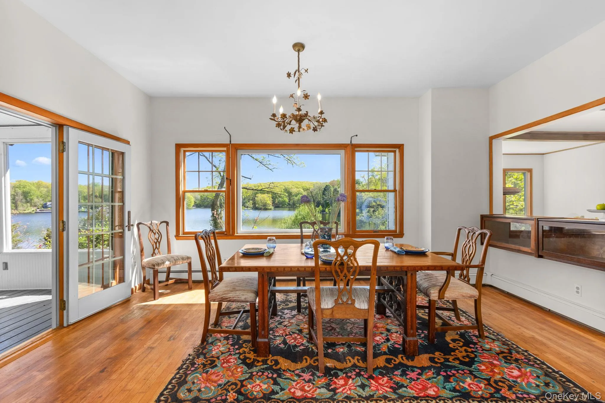 Oversized window welcomes in lake views and sunshine Oversized window welcomes in lake views and sunshine