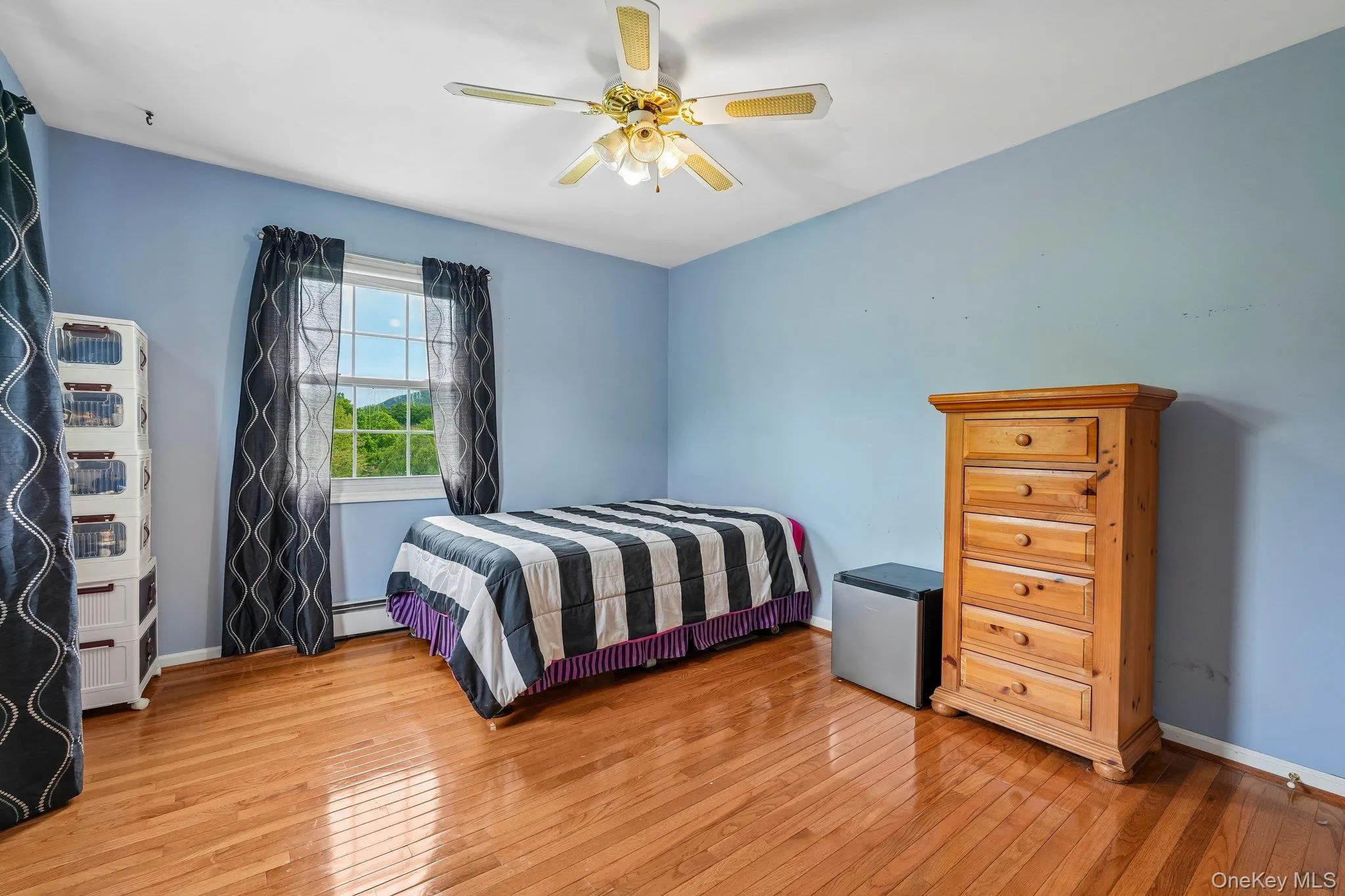 Bedroom #2 - Spacious second bedroom featuring hardwood floors, large windows, and a bright, airy feel. Bedroom #2 - Spacious second bedroom featuring hardwood floors, large windows, and a bright, airy feel.