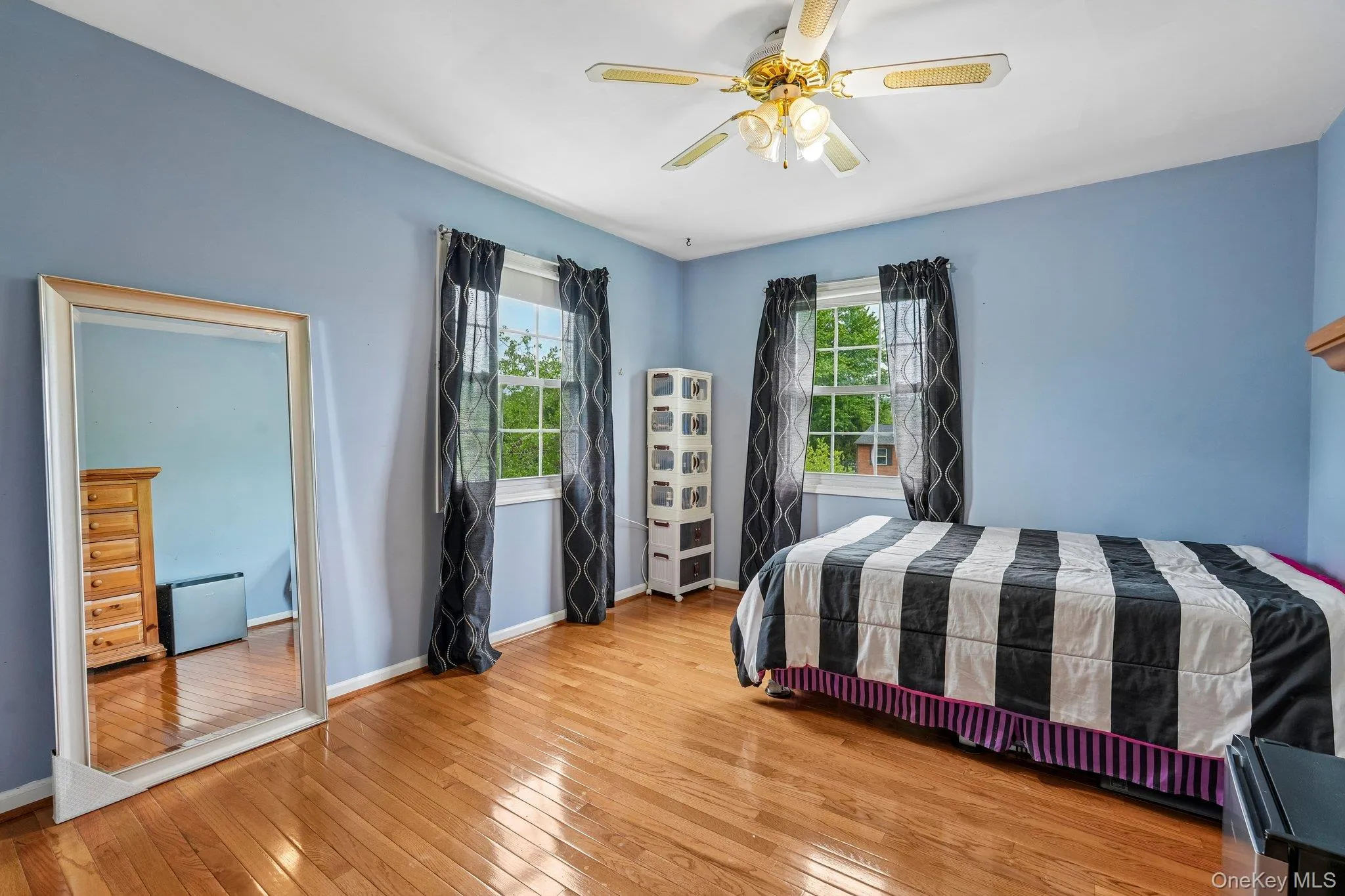 Bedroom #2 - Spacious second bedroom featuring hardwood floors, large windows, and a bright, airy feel. Bedroom #2 - Spacious second bedroom featuring hardwood floors, large windows, and a bright, airy feel.