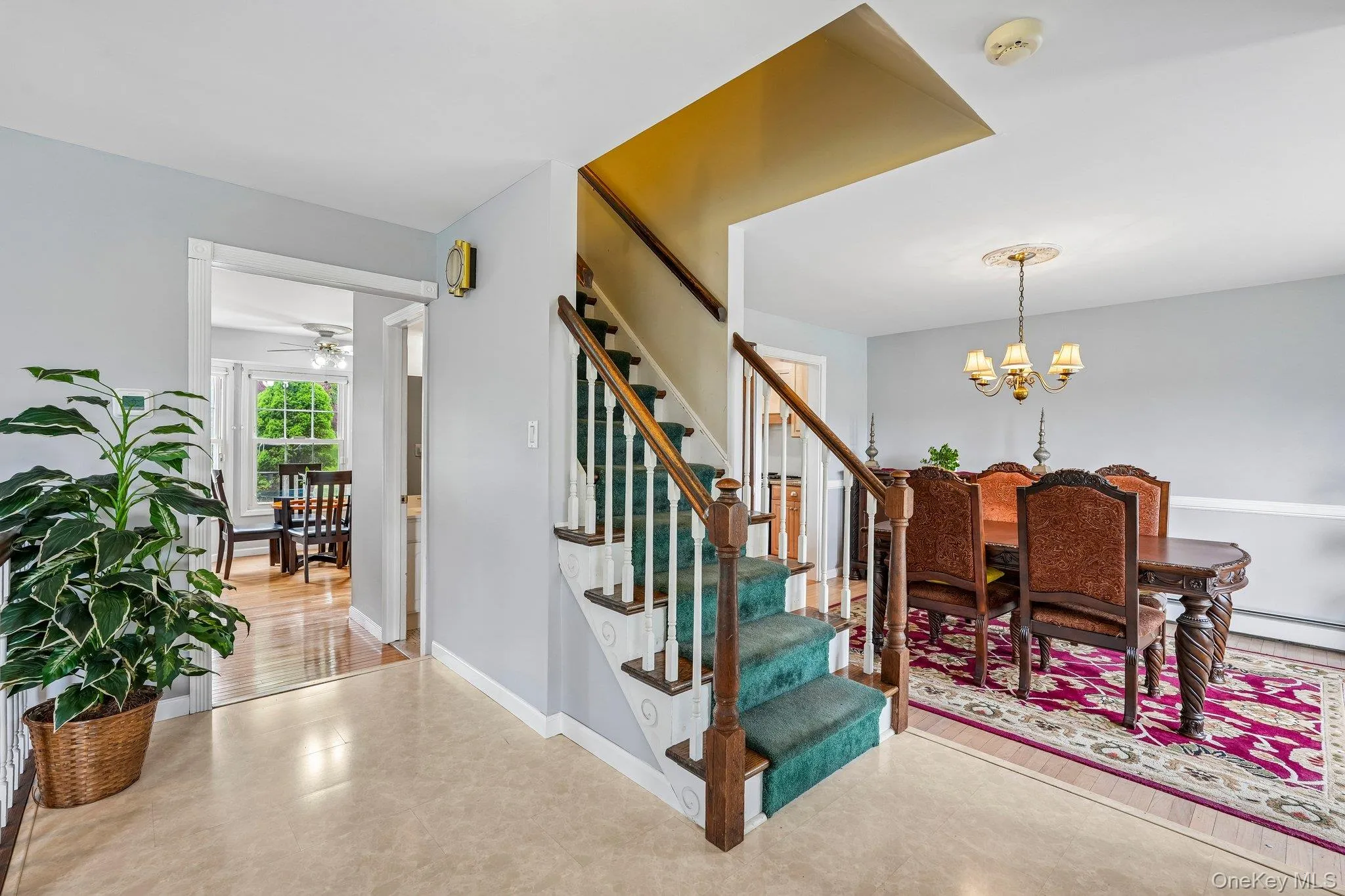 View from the foyer overlooking the formal dining room, offering a seamless flow ideal for entertaining and everyday living. View from the foyer overlooking the formal dining room, offering a seamless flow ideal for entertaining and everyday living.