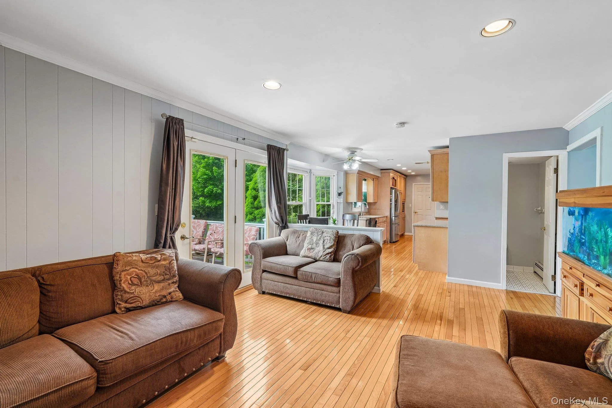Spacious family room with a comfortable layout, perfect for everyday living and entertaining, with seamless indoor-outdoor flow. Spacious family room with a comfortable layout, perfect for everyday living and entertaining, with seamless indoor-outdoor flow.