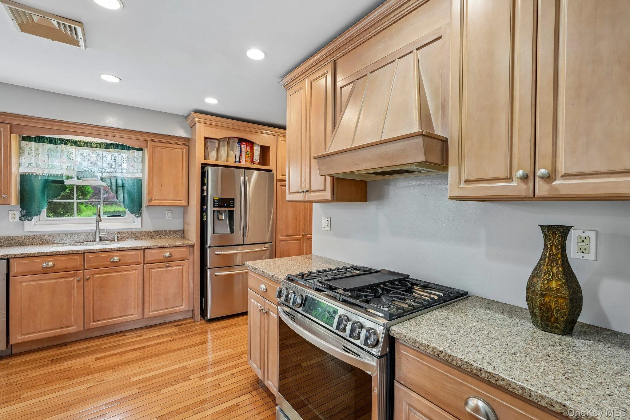 Expansive kitchen offering extensive cabinetry and workspace, providing both functionality and convenience. Expansive kitchen offering extensive cabinetry and workspace, providing both functionality and convenience.