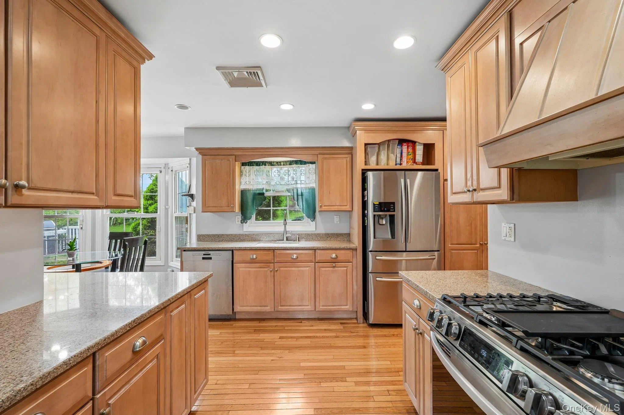 Well-appointed kitchen with updated appliances, generous storage, and an open feel ideal for preparing meals and gathering. Well-appointed kitchen with updated appliances, generous storage, and an open feel ideal for preparing meals and gathering.