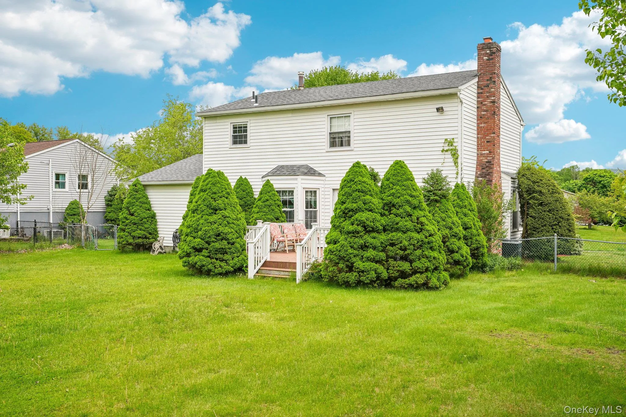 Expansive backyard featuring a large open lawn with plenty of space for outdoor enjoyment and recreation. Expansive backyard featuring a large open lawn with plenty of space for outdoor enjoyment and recreation.