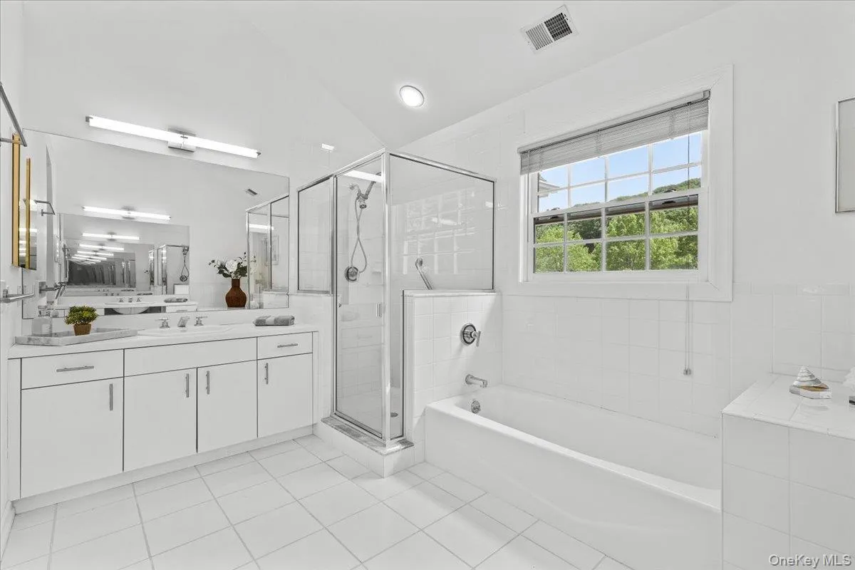 with bath, walk in shower and double sinks with bath, walk in shower and double sinks