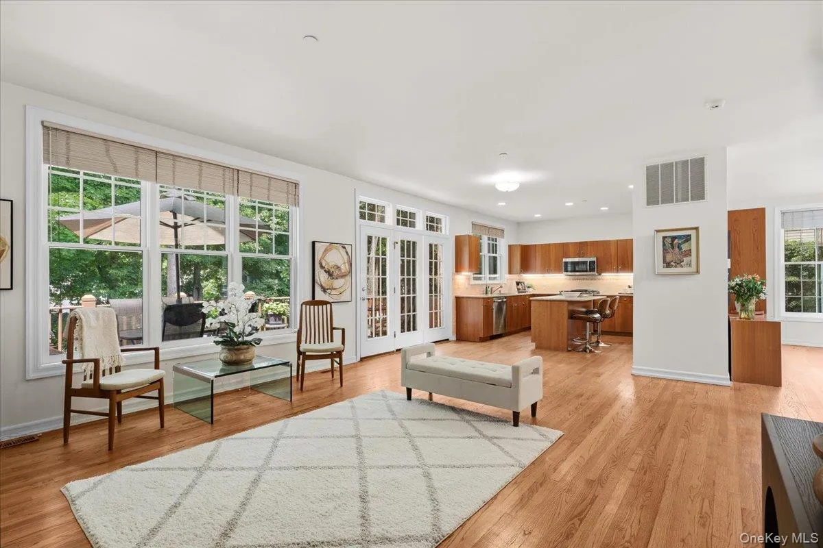 Light filled open family room and.kitchen with door to deck Light filled open family room and.kitchen with door to deck