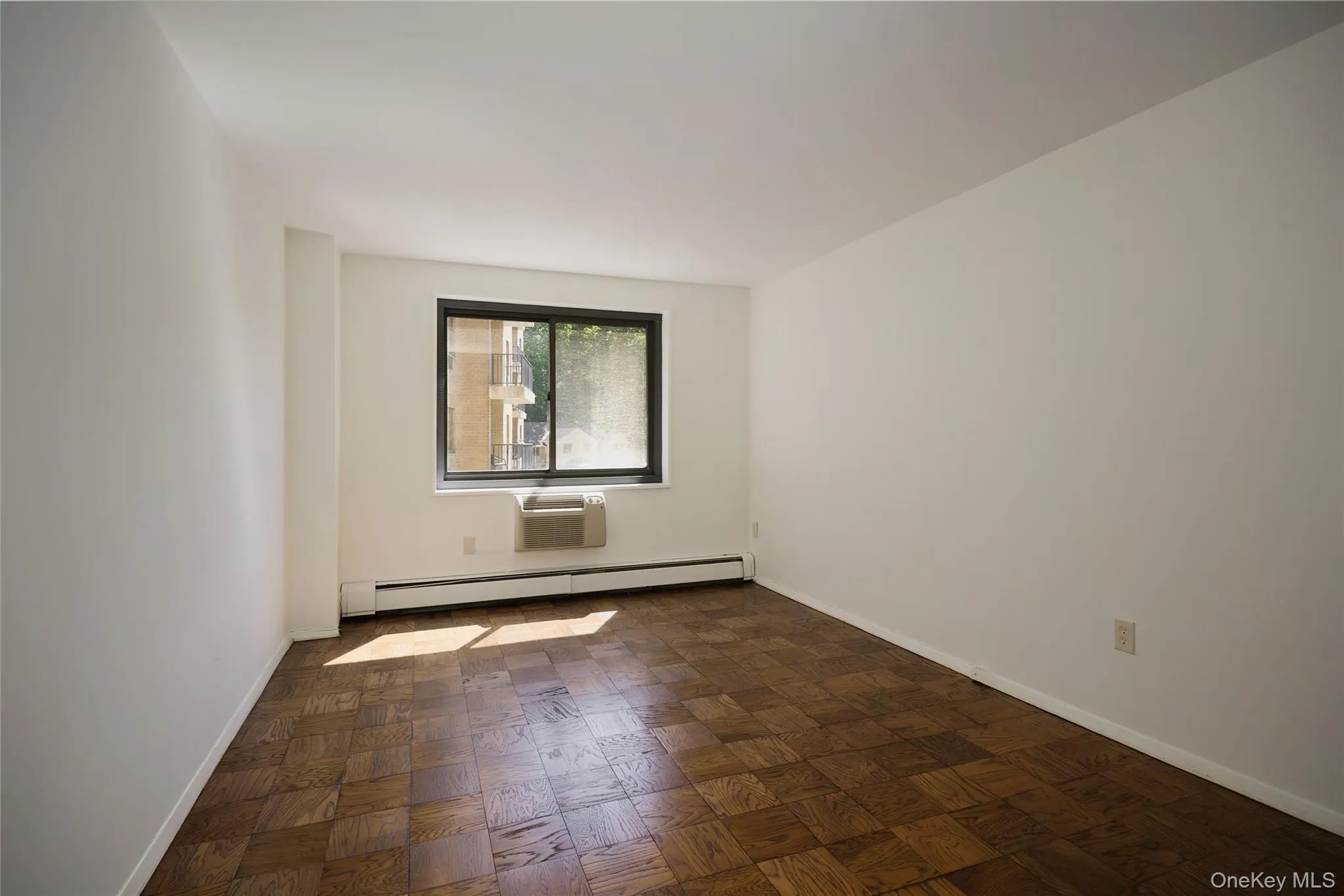 2nd generous sized bedroom with parquet floors and overlooking the courtyard 2nd generous sized bedroom with parquet floors and overlooking the courtyard