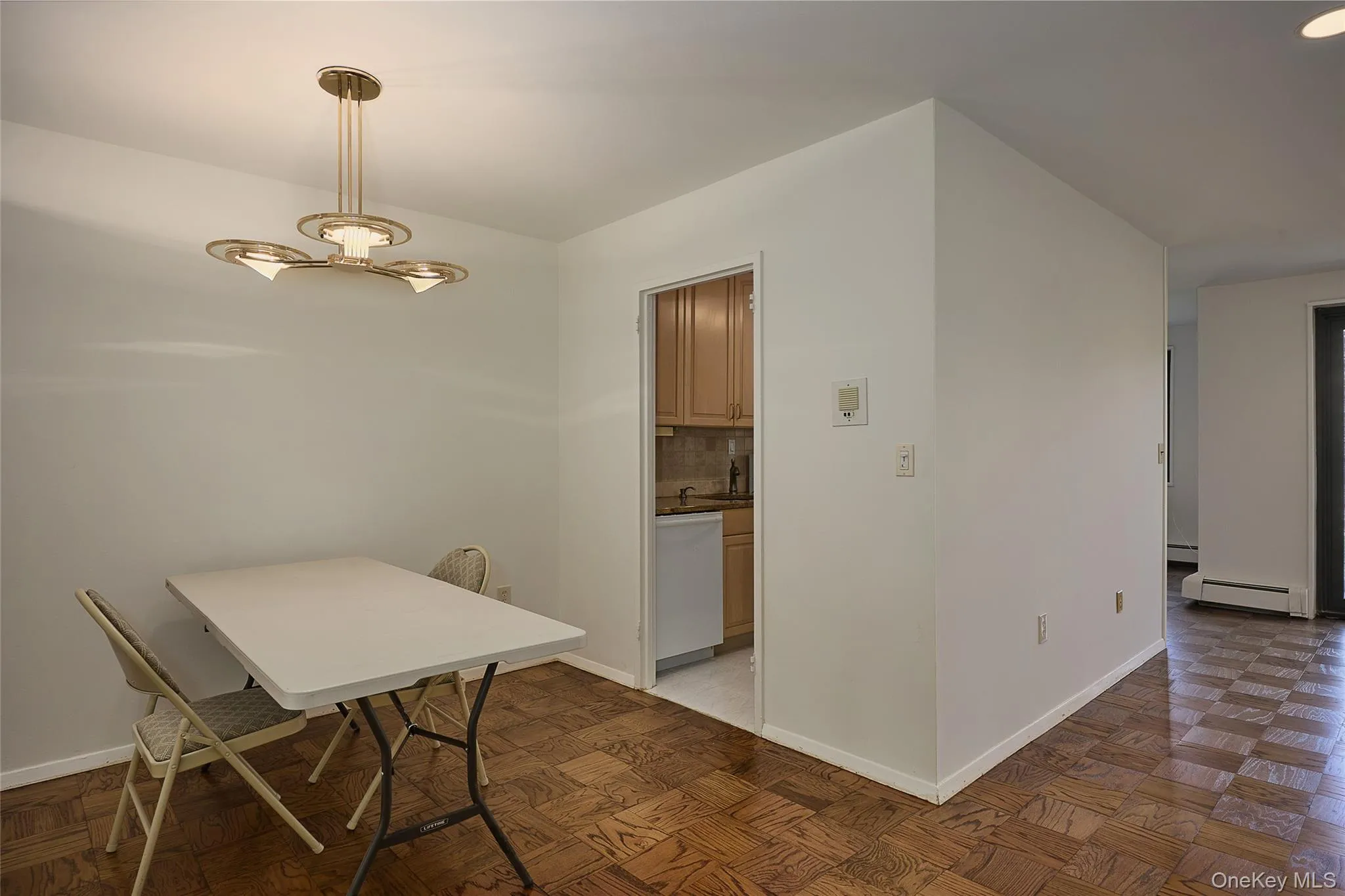 Dining area with entry to kitchen Dining area with entry to kitchen