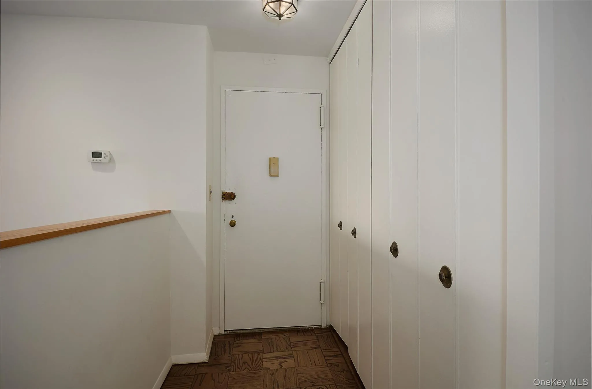 Entrance with double closets Entrance with double closets